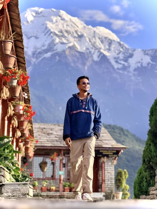 On a terrace under a snow peak, Nepal.