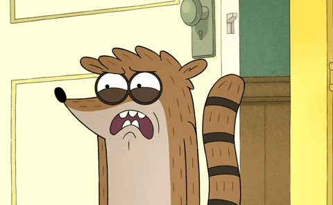 Someone recoiling with a sour, disgusted expression after tasting something unpleasant.