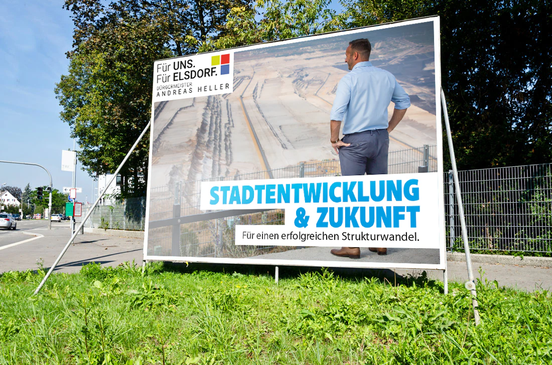 Großflächen-Präsentation der Andreas-Heller-Kampagne mit sichtbarem Logo und Stadtentwicklungsmotiv