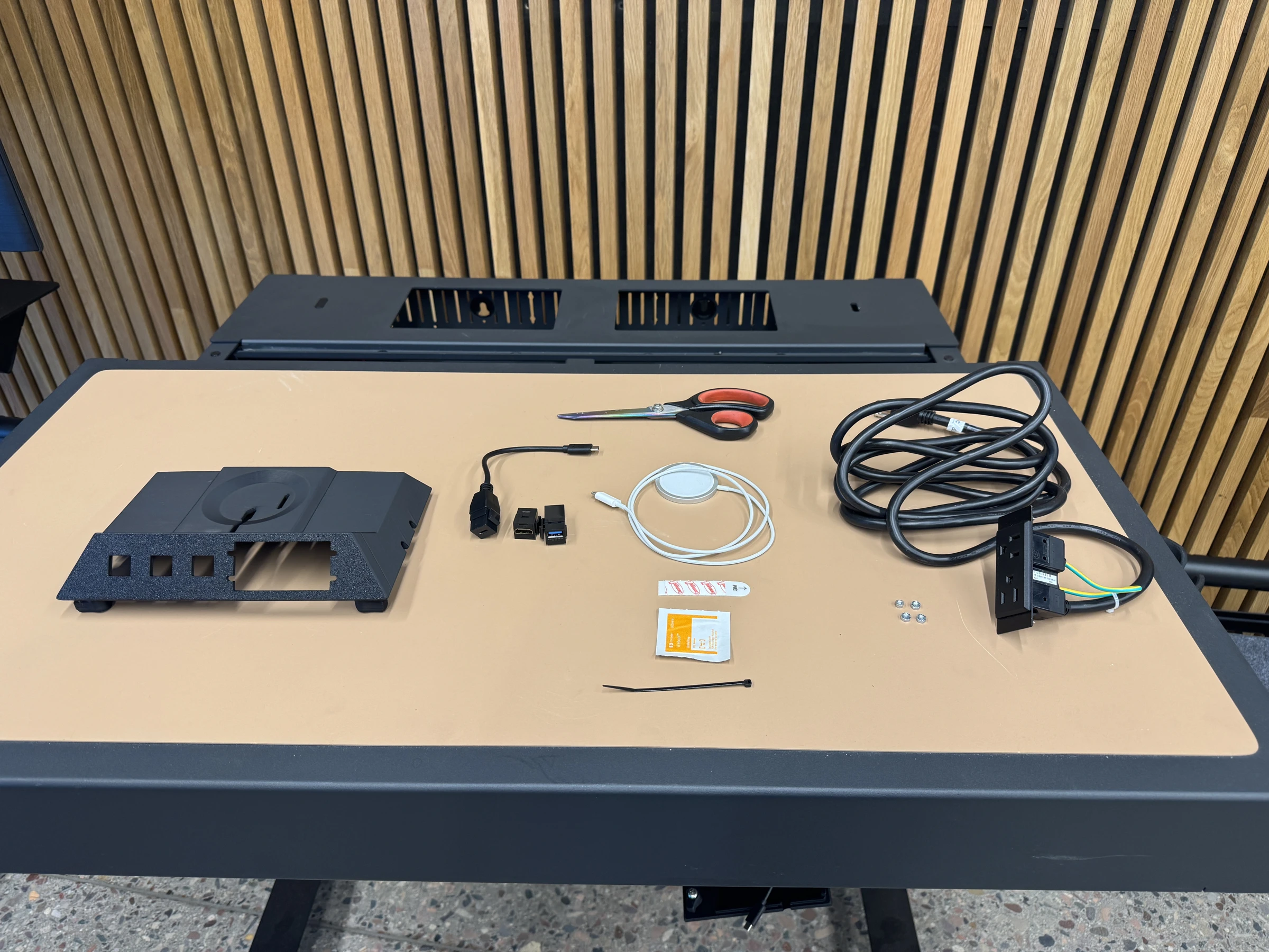 Photograph 1. The insert, cables, modules, and preparation materials laid out on the work surface.