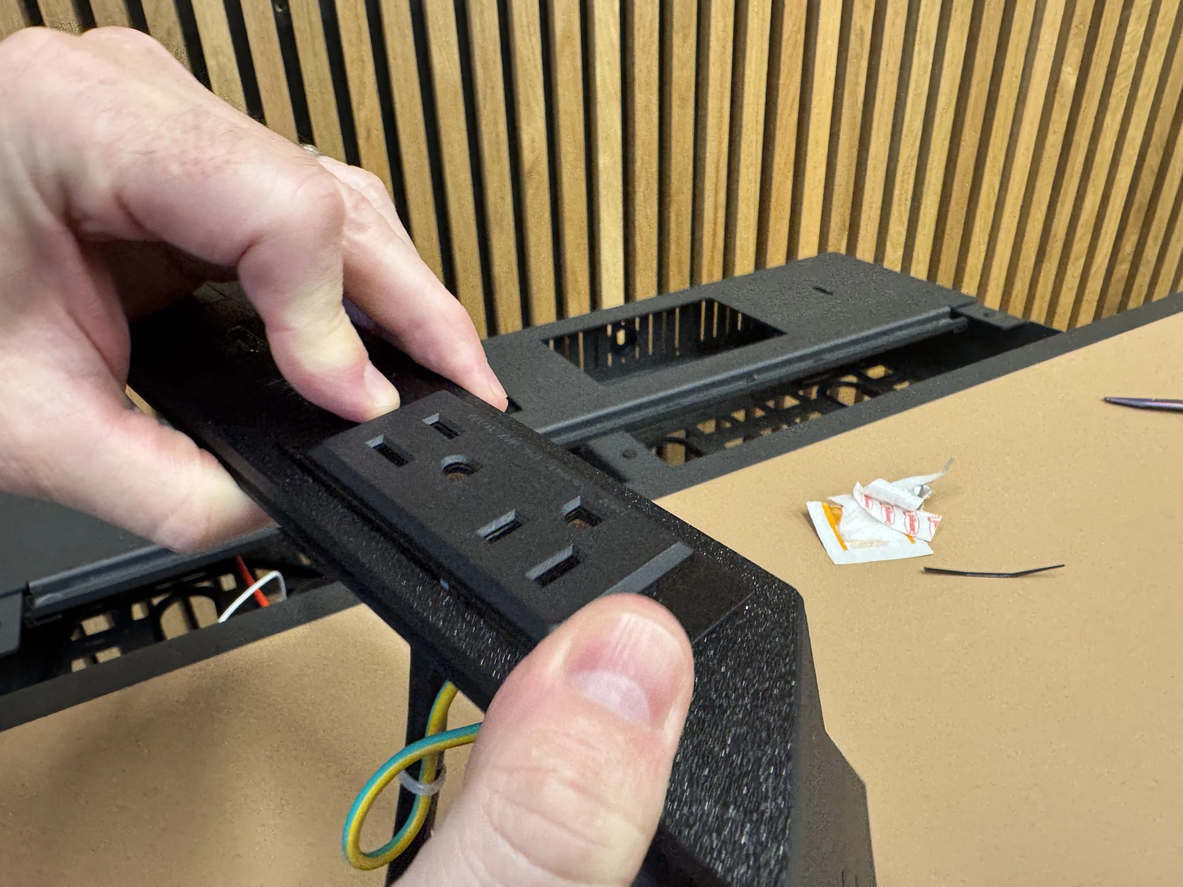 Photograph 23. Holding the power module flush against the insert.