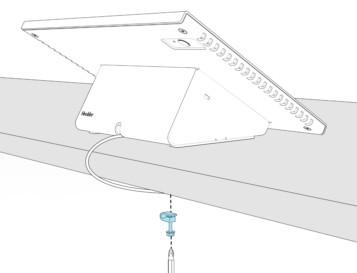 Rear view of the console on a table, with the Ethernet cable routed over the edge and a cable anchor, screw, and screwdriver positioned beneath the tabletop.