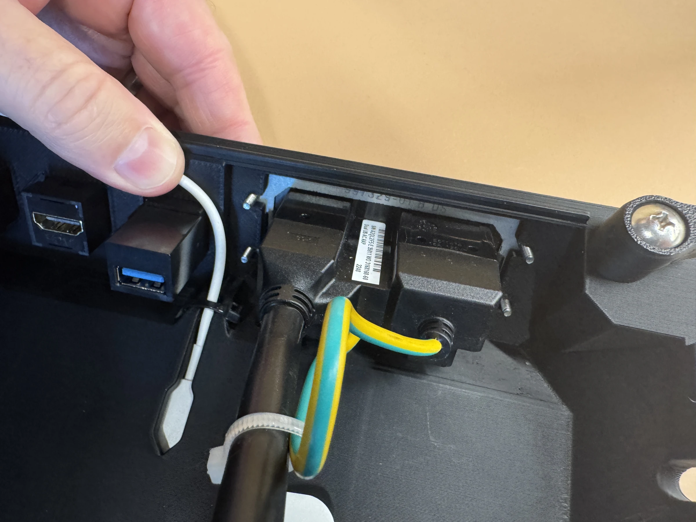Photograph 24. The power module seated with four mounting studs exposed beneath the insert.