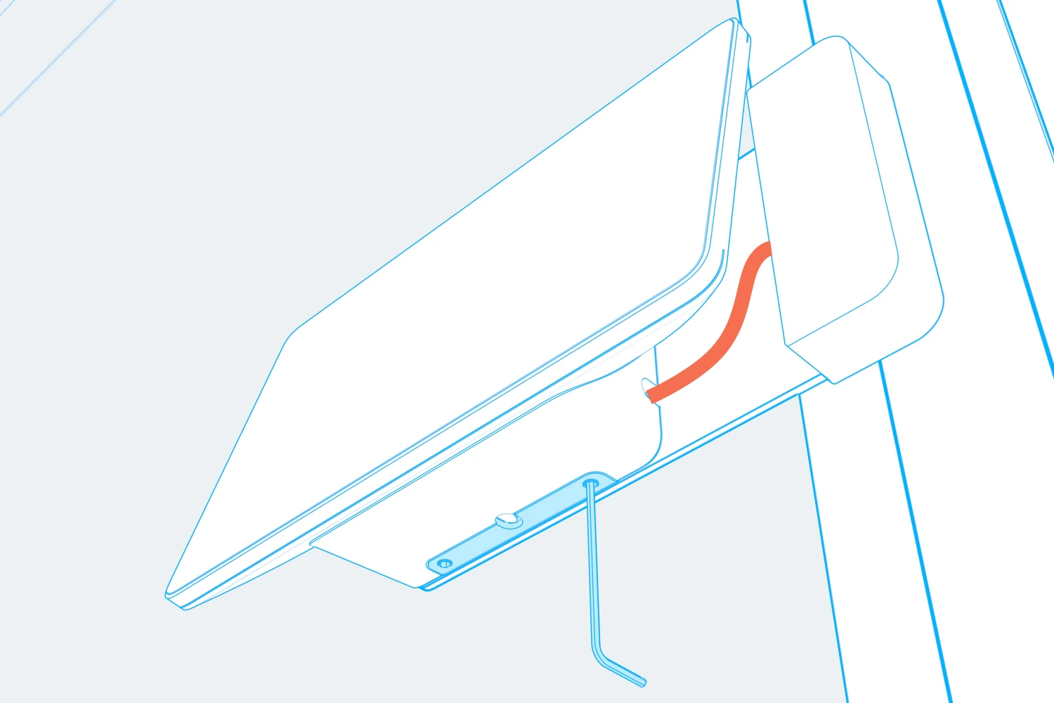 Underside view of the Neat Pad with a hex key at its retaining set screw.