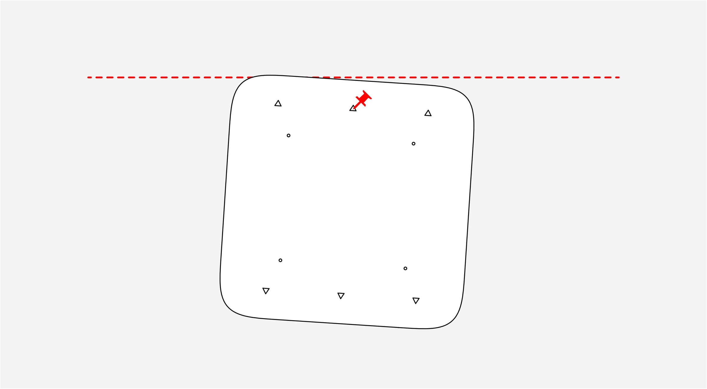 Installation template suspended from a push pin below a horizontal laser-level reference line.