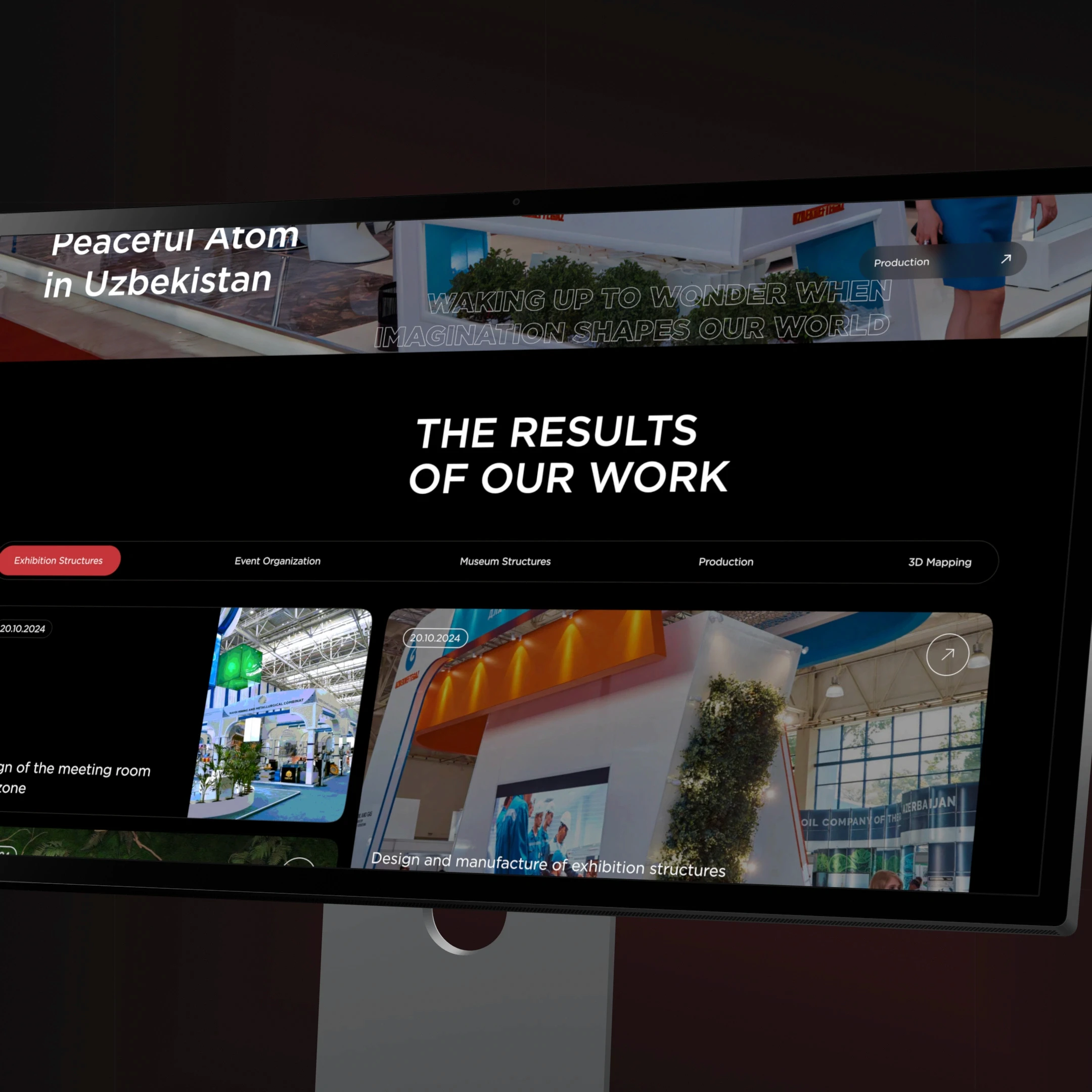 Portfolio web page showing exhibition stand designs for UzAtom and Lukoil, highlighting large-scale event structures and production.