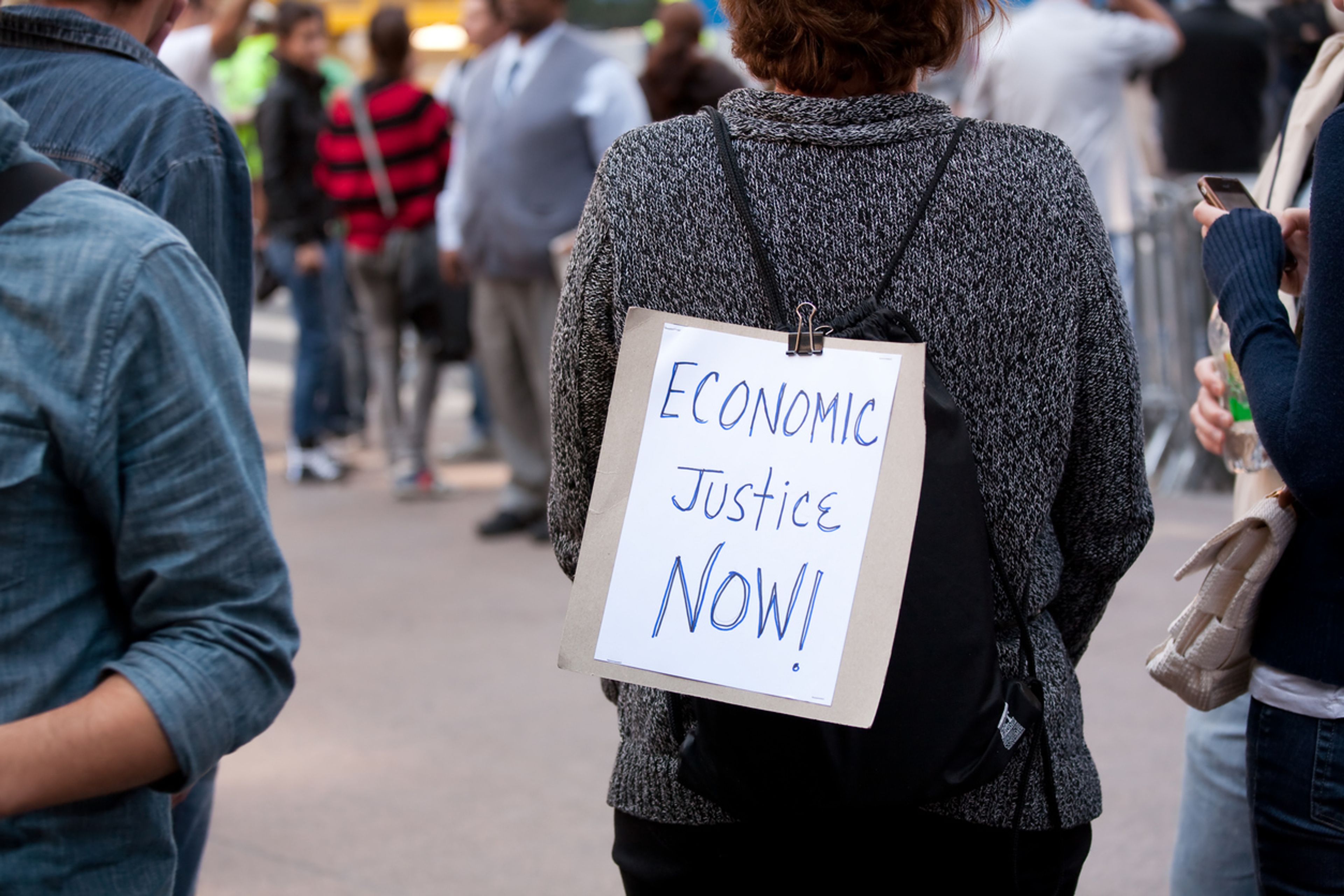 A demonstrator rallies in New York on October 6, 2011, during Occupy Wall Street, a movement protesting income inequality and corporate influence in the wake of the financial crisis.
