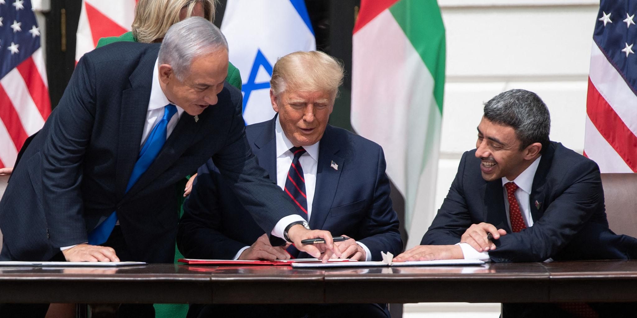 Israeli Prime Minister Benjamin Netanyahu (left) joins US President Donald Trump and UAE Foreign Minister Abdullah bin Zayed Al Nahyan (right) at the White House for the signing of the Abraham Accords, which normalised diplomatic relations between Israel and the UAE, September 15, 2020. Photo: Tia Dufour/White House Gallery