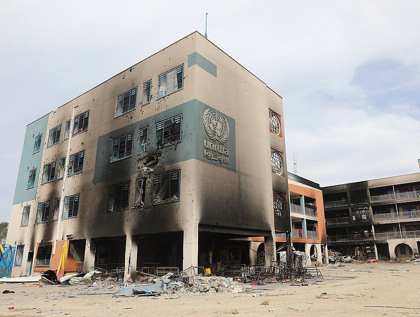 A fire-gutted UNRWA co-education school lies in ruins in the Gaza Strip, after an Israeli strike. The US is the major arms supplier to Israel. Photo: UNRWA/Abedallah Alhaj