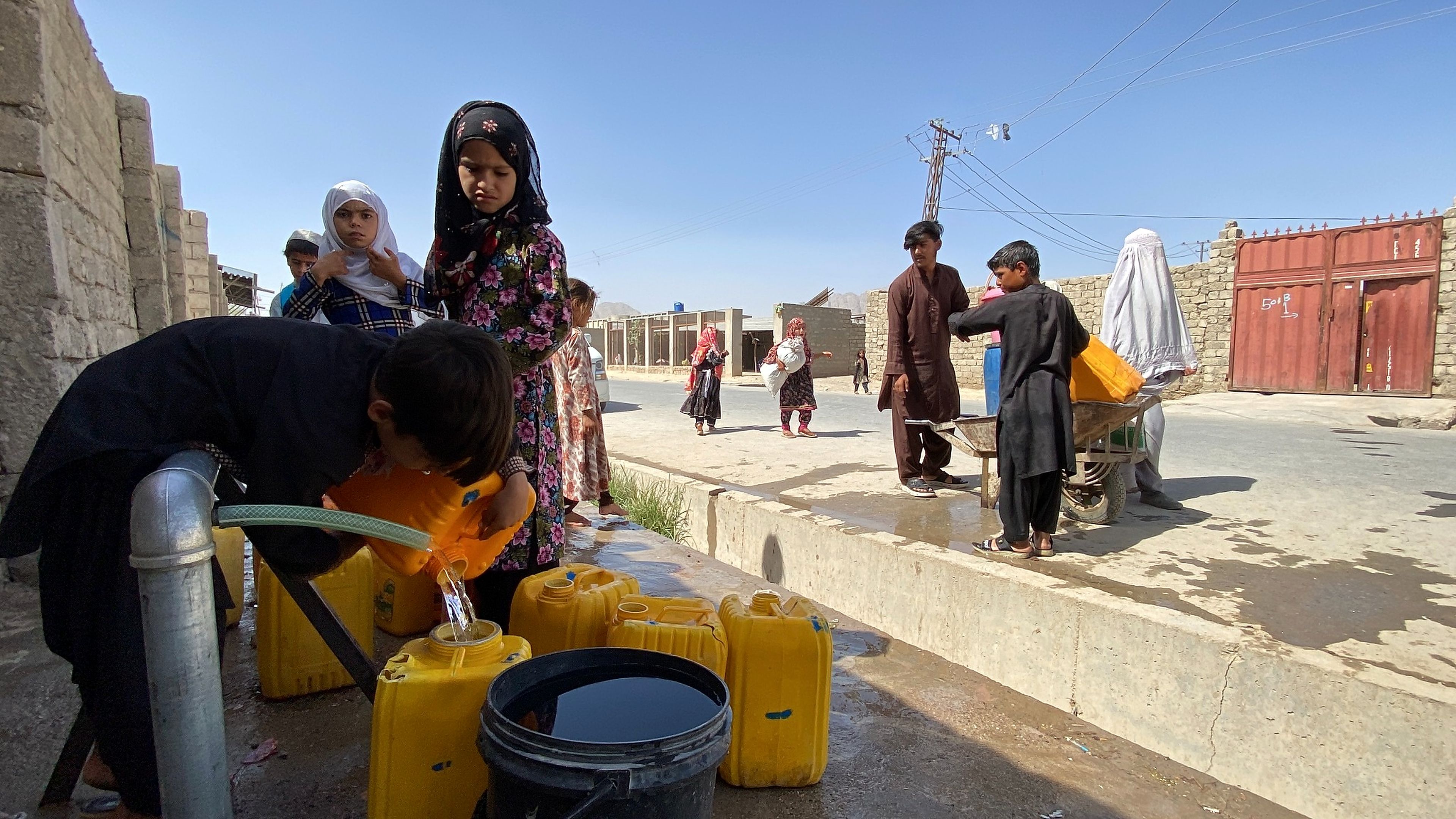 Droughts are affecting the schooling of the children as they are being engaged to fetch water. Teachers fear the problem could only grow with time. Photo: Wahid Rahman Afghanmal