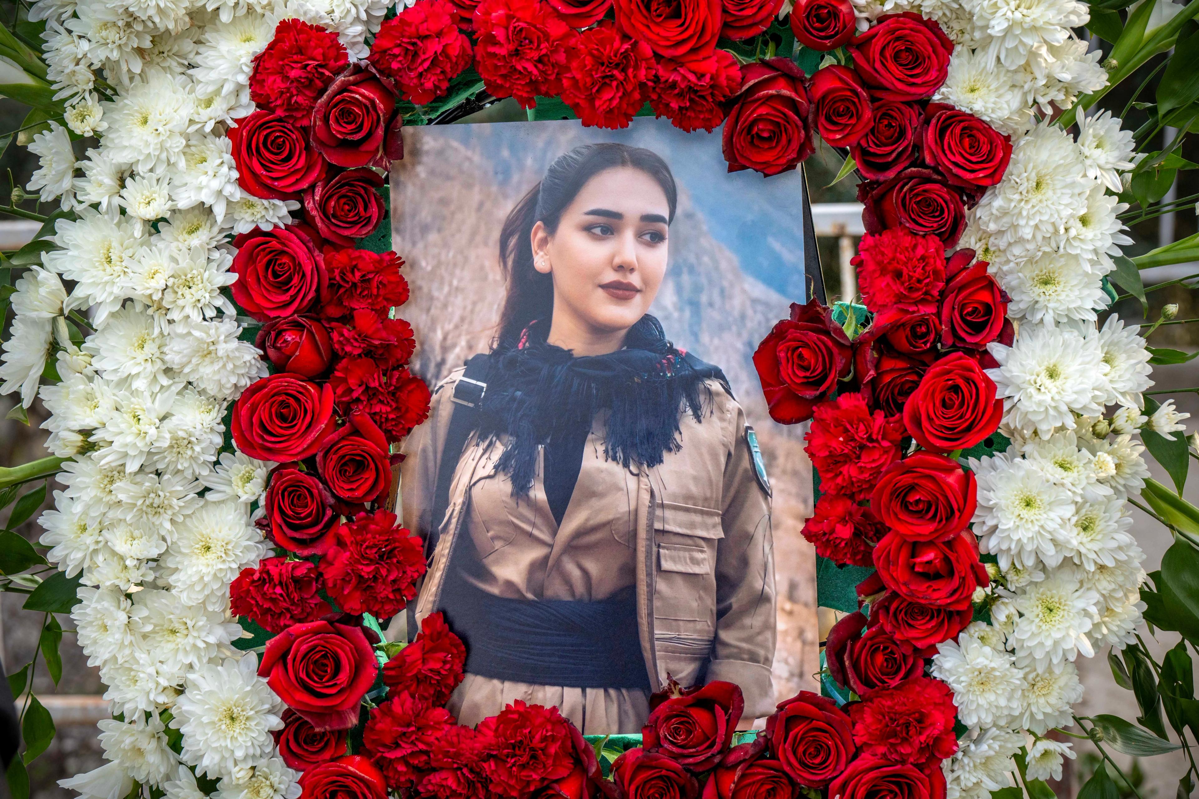  A memorial wreath for Ghazal Molan, 19, at her funeral in Sulaymaniyah, Iraq on April 16, 2026. 