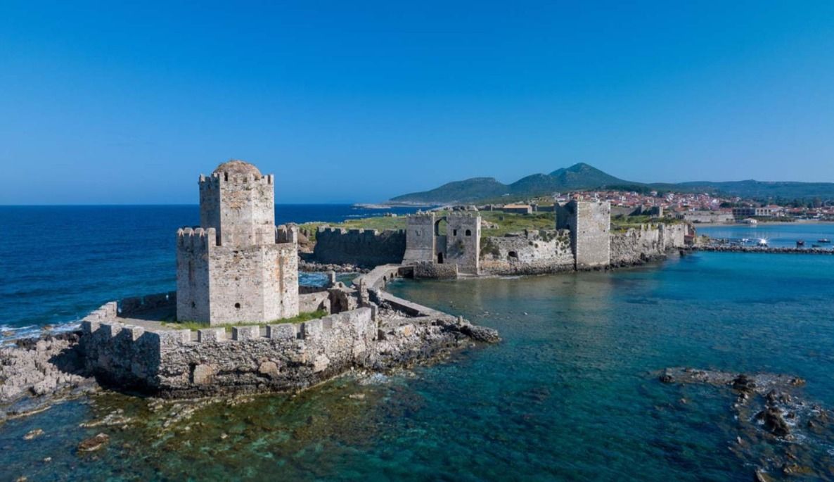 Methoni Castle and its iconic Bourtzi sea fort, seen on a rocky islet off the coast of Messenia in southwestern Greece. The medieval fortress is one of the Mediterranean’s most important fortified complexes and was strategically positioned along major sea routes. 