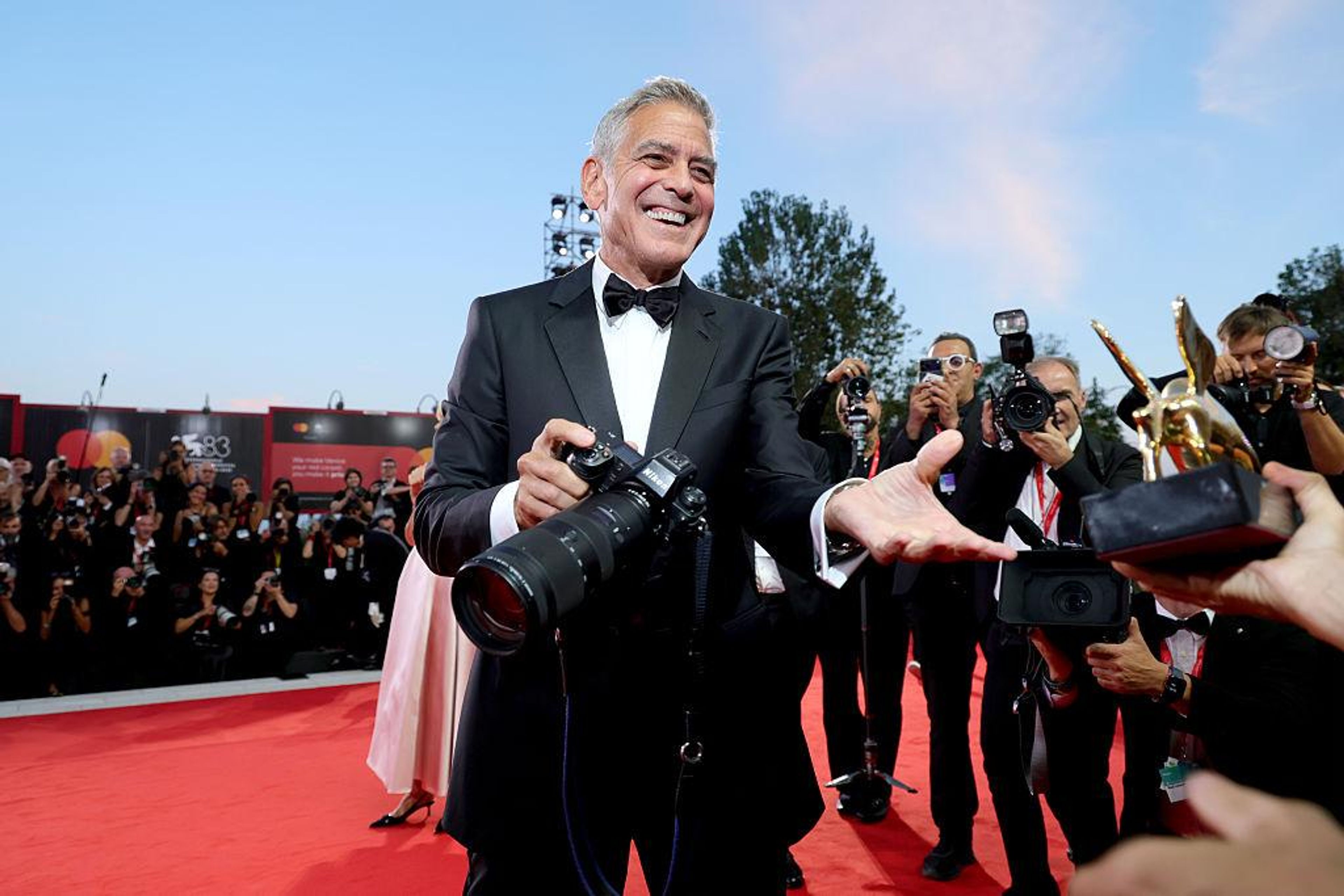 George Clooney poses for photographers on the red carpet at the 83rd Venice International Film Festival on September 2, 2026. Clooney and Ellen Burstyn shared the Golden Lion for Lifetime Achievement. Photo: LucaFazPhoto/Wikimedia Commons, CC BY-SA 4.0