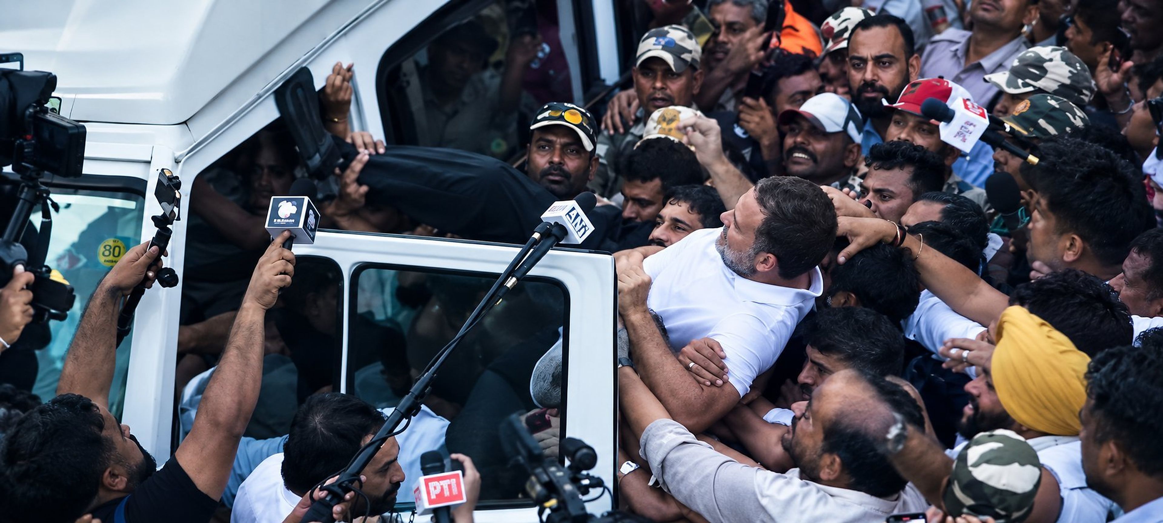 Leader of Opposition Rahul Gandhi is detained by police during a protest against Chief Election Commissioner Gyanesh Kumar in New Delhi on October 6, as supporters attempt to prevent his detention. Photo: Indian National Congress
