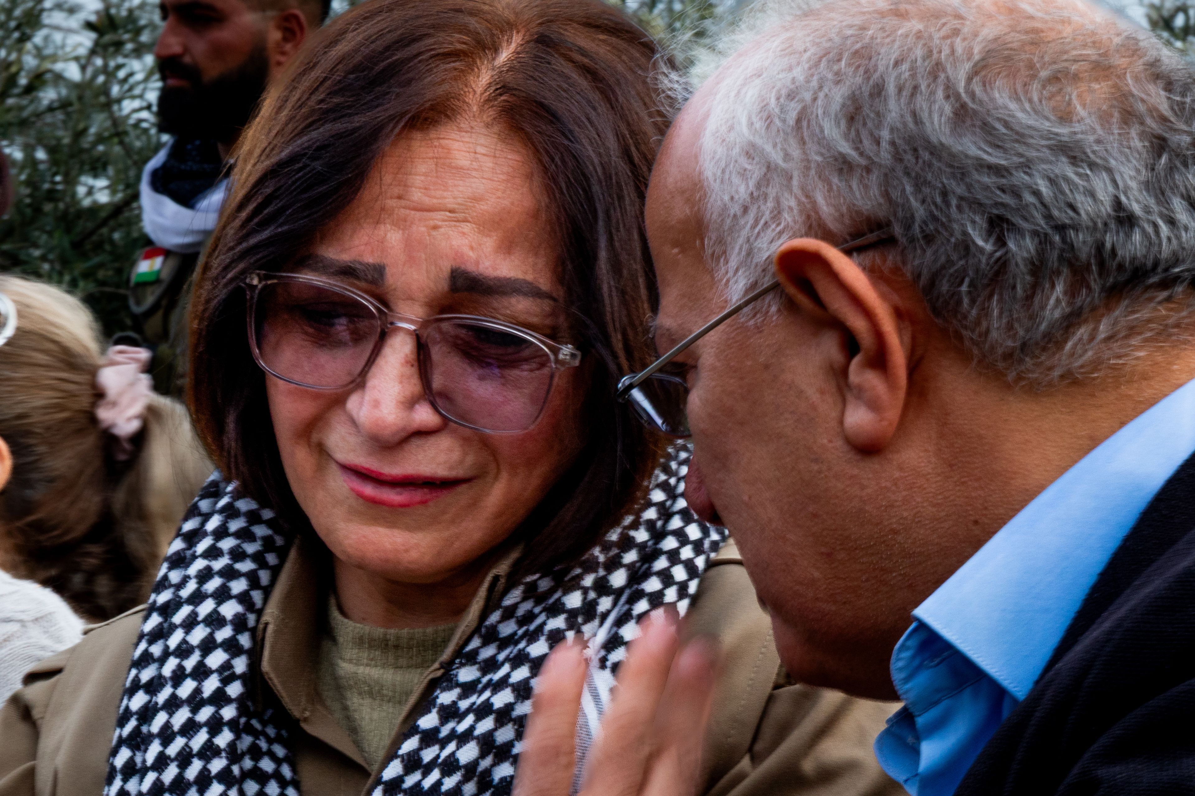 Mourners console one another at the funeral of Ghazal Molan in Sulaymaniyah, Iraq. 