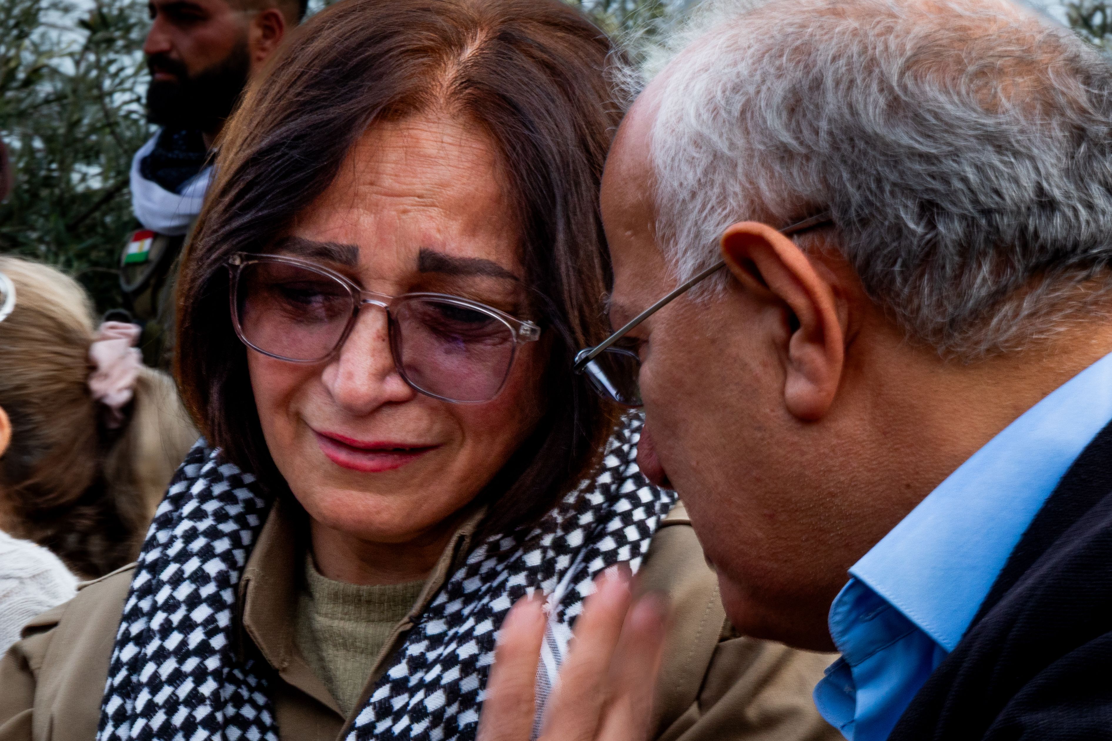 Mourners console one another at the funeral of Ghazal Molan in Sulaymaniyah, Iraq.