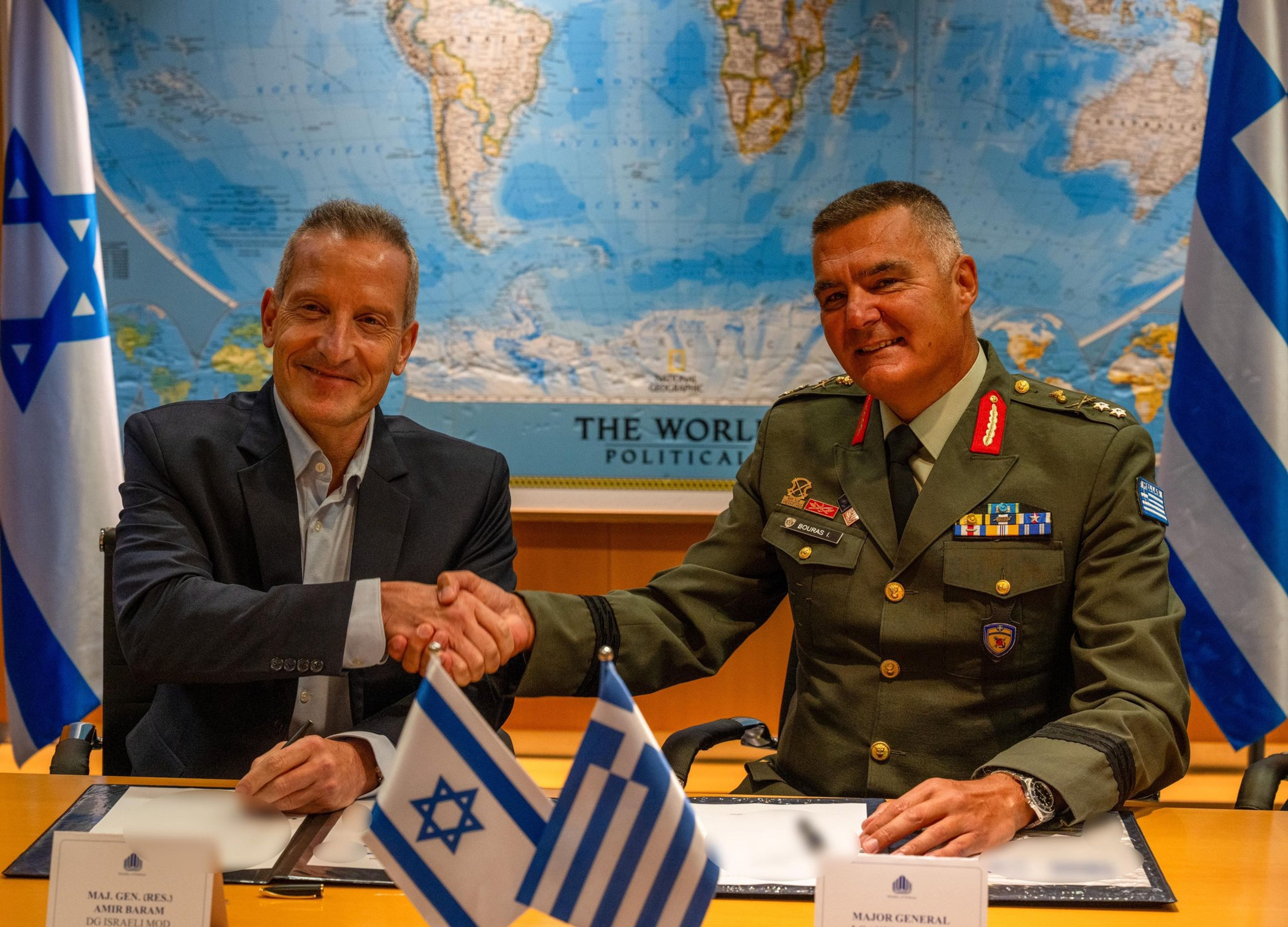 Israel Ministry of Defence Director-General Amir Baram (left) and his Greek counterpart, Ioannis Bouras, sign the €3 billion “Achilles Shield” air defence agreement at the Defence Ministry’s headquarters in Tel Aviv, August 31 2026. Photo: Israeli Ministry of Defence