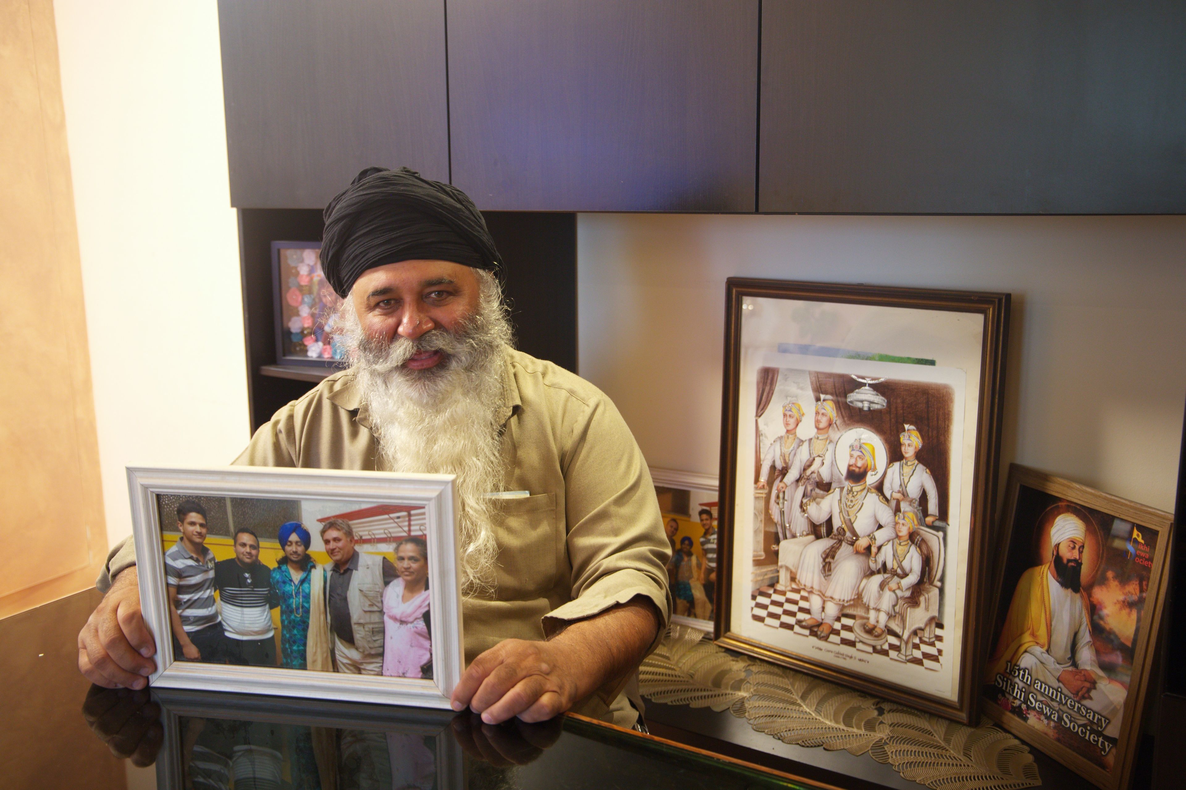 Singh Bhupinder Kang, 68, Harpreet’s father, arrived in Italy in 1990. After years working as a farmhand, he now helps his children run the farm and looks after his grandchildren. He is president of the Sikh temple in Parma. Photo: Monica Pelliccia