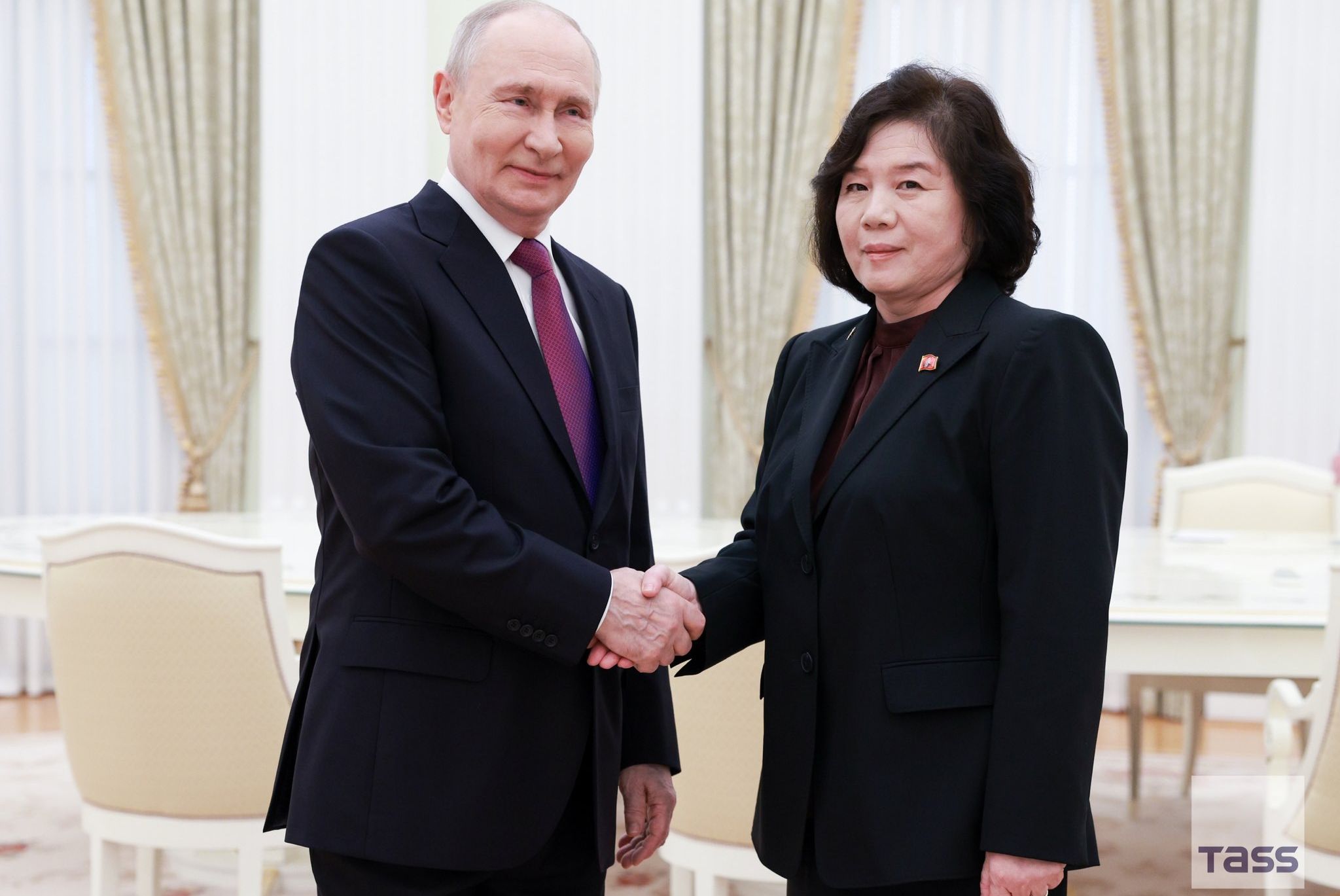 Russia's Vladimir Putin with North Korea's Foreign Minister Choe Son Hui