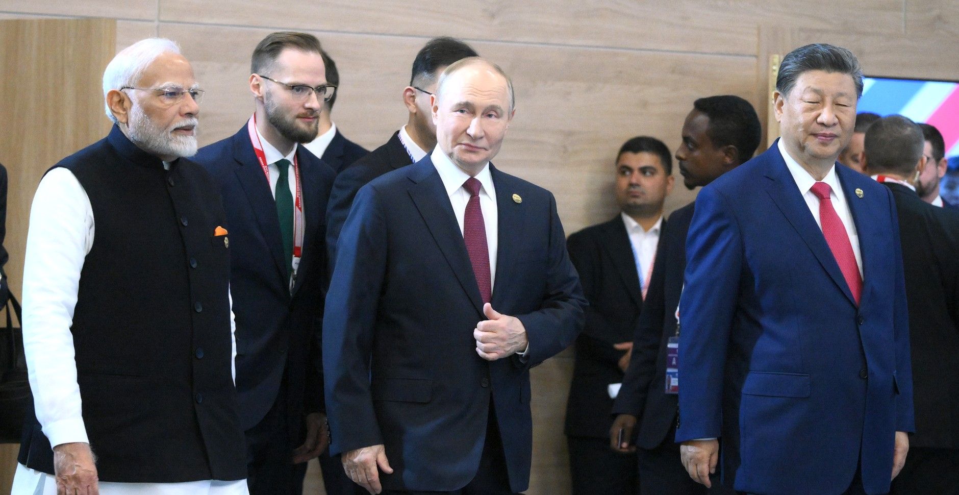 Modi, Putin and Xi arrive together at a BRICS summit session, in a rare joint appearance by the leaders of India, Russia and China.