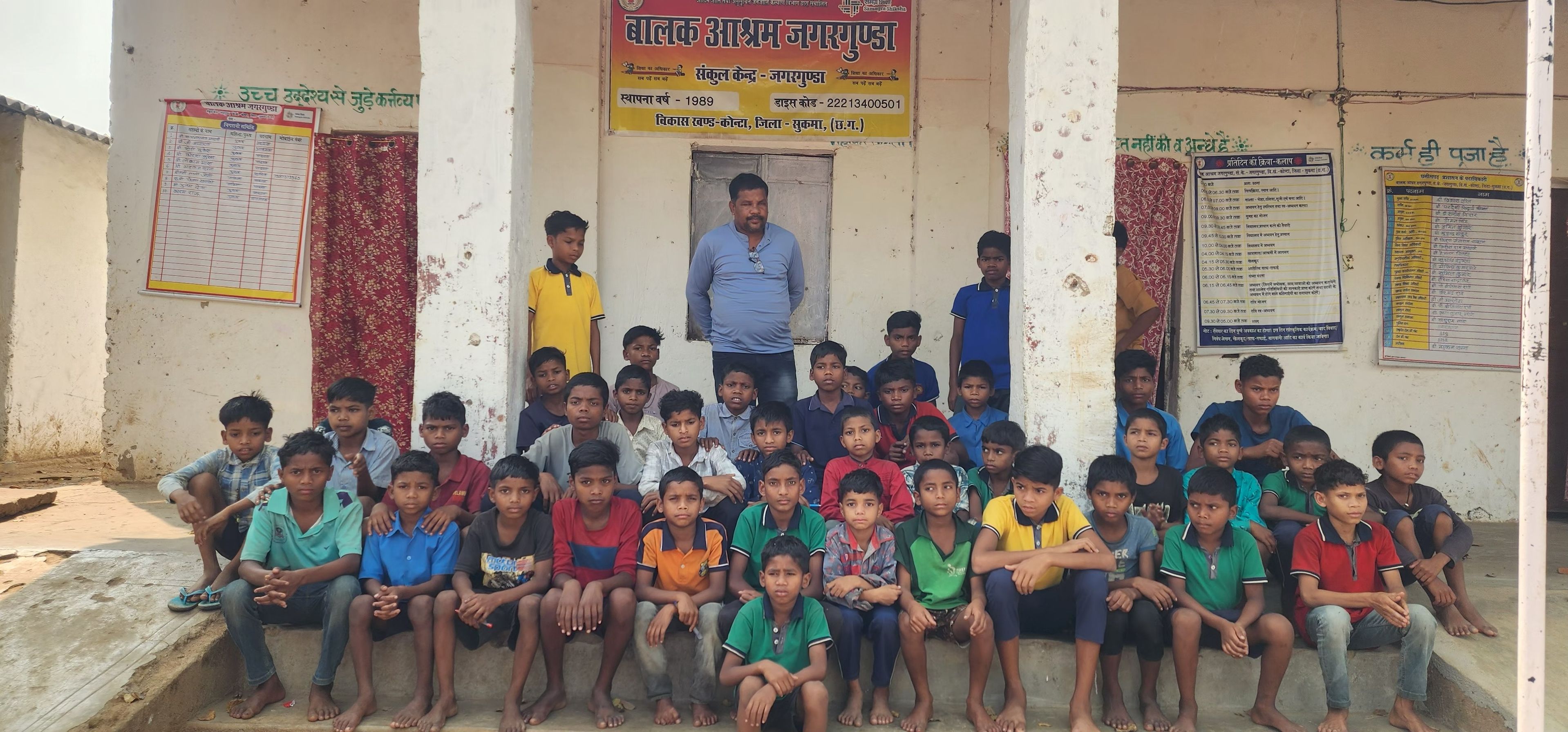 Children with their teacher-cum-warden at Balak Aashram or residential school for children from Maoist-affected areas in Sukma district, Chhattisgarh. 
