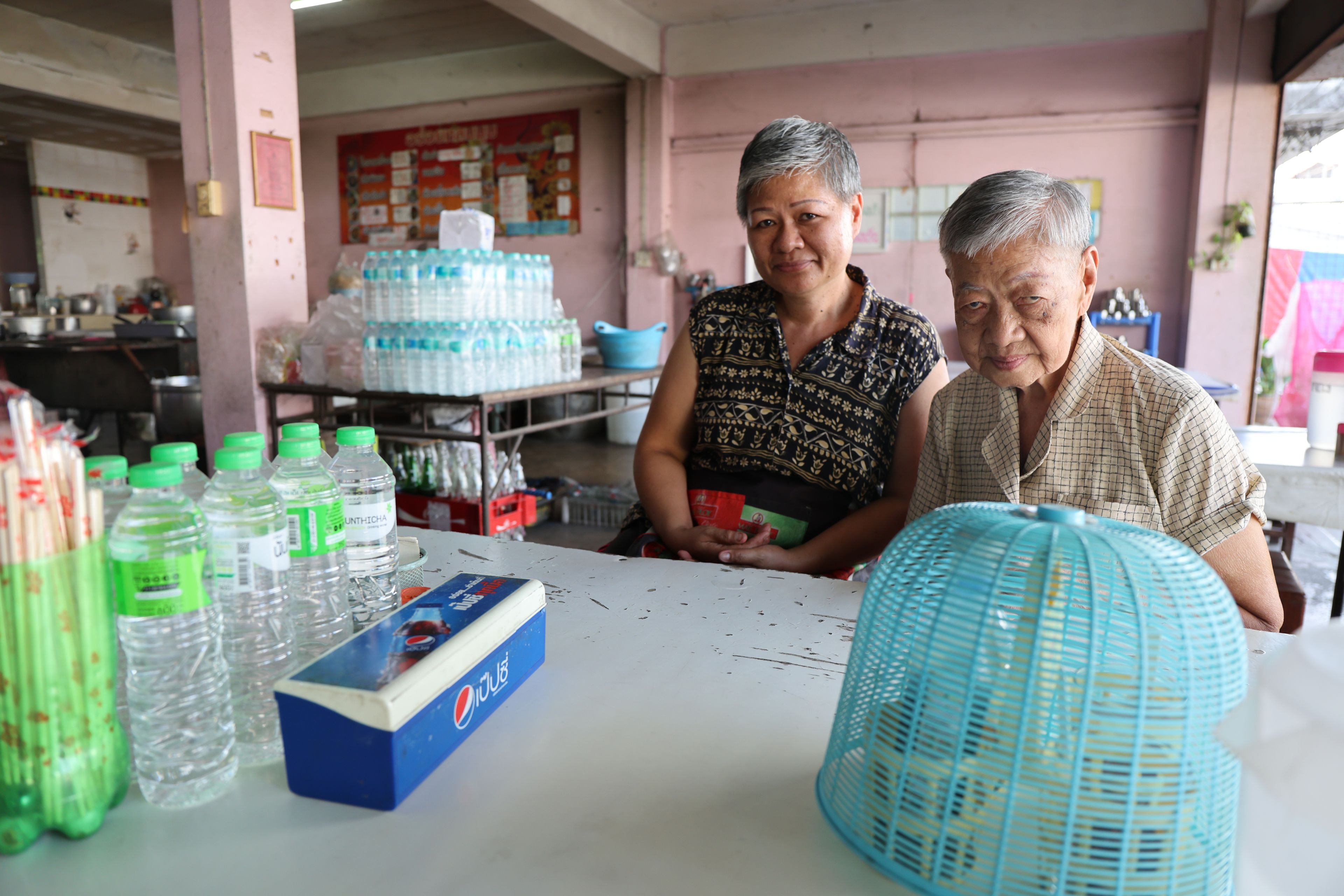 Jeeranporn Anandechsak and her mother at their noodle shop in Sa Kaeo, Thailand.