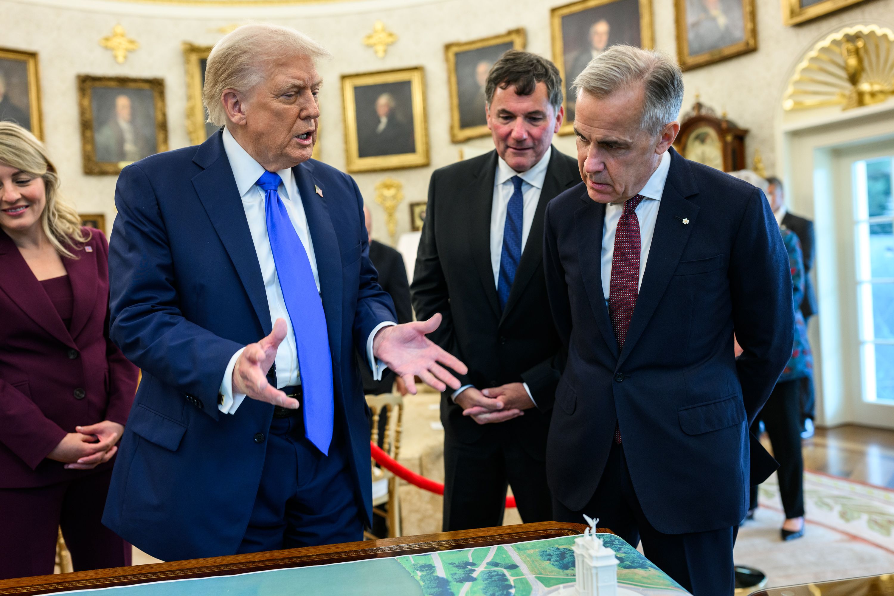 President Trump shows Canadian PM Mark Carney a model of the proposed “Independence Arch” in the Oval Office, October 7, 2025. Photo: The White House Gallery