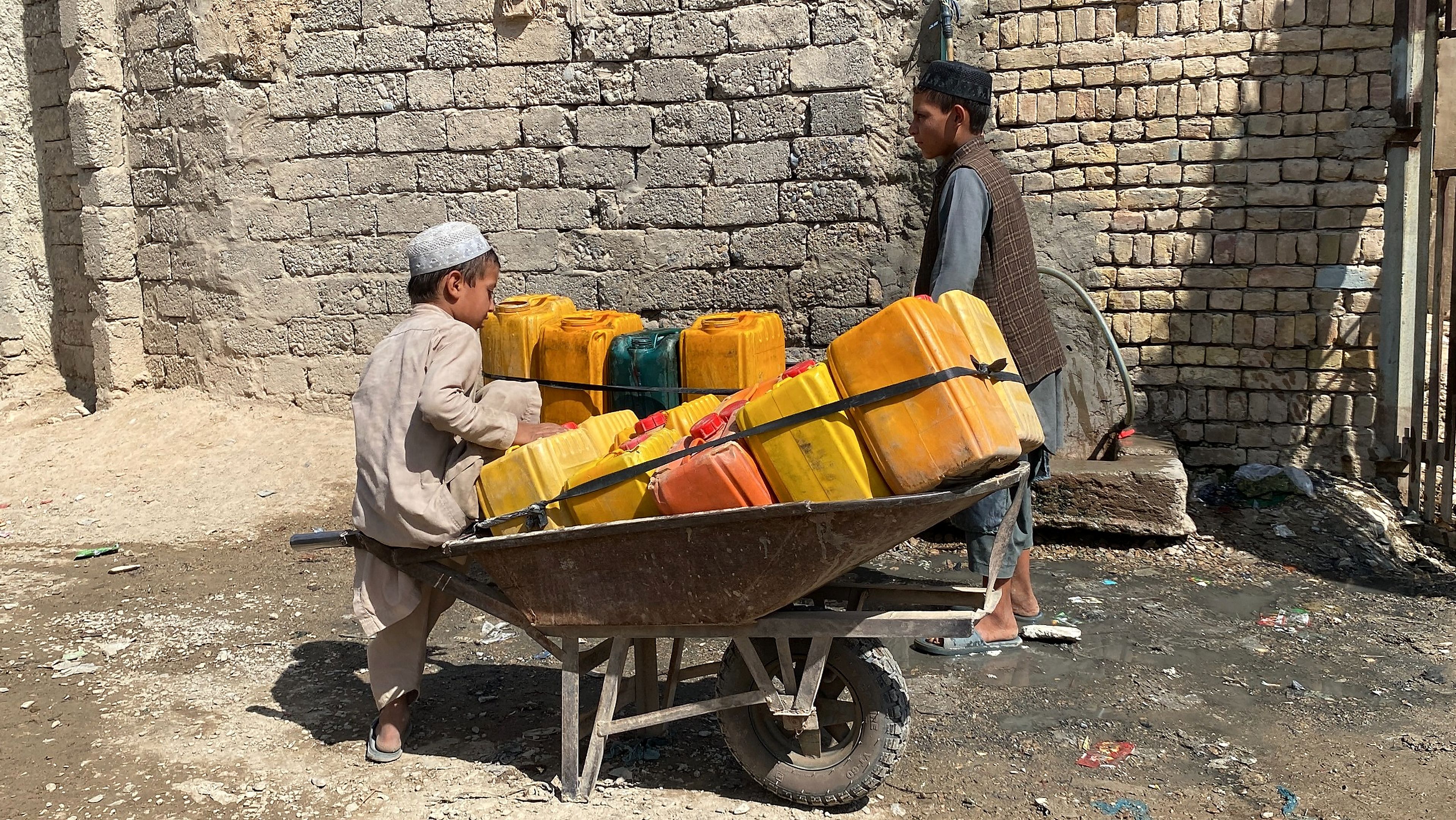 For many Afghan children, jerrycans have become their daily companions. Photo: Wahid Rahman Afghanmal