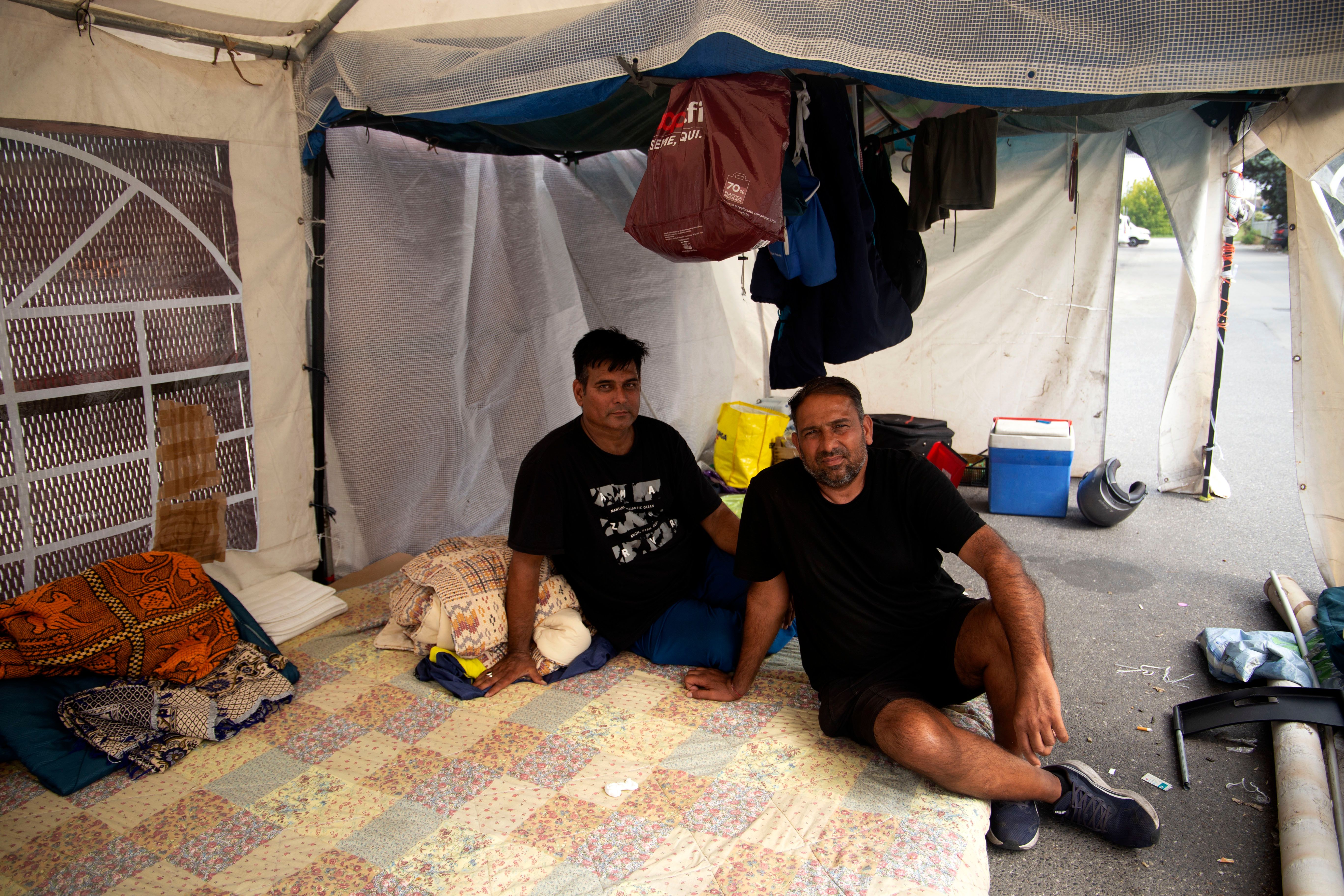 Marios Singh Choudhary, 51, and Manda Likhama Ram, 40, two Indian workers at Acca, took part in a protest outside the company’s premises in Campi Bisenzio, Italy. They remained at the gates for more than 70 days. August 2026. Photo: Monica Pelliccia