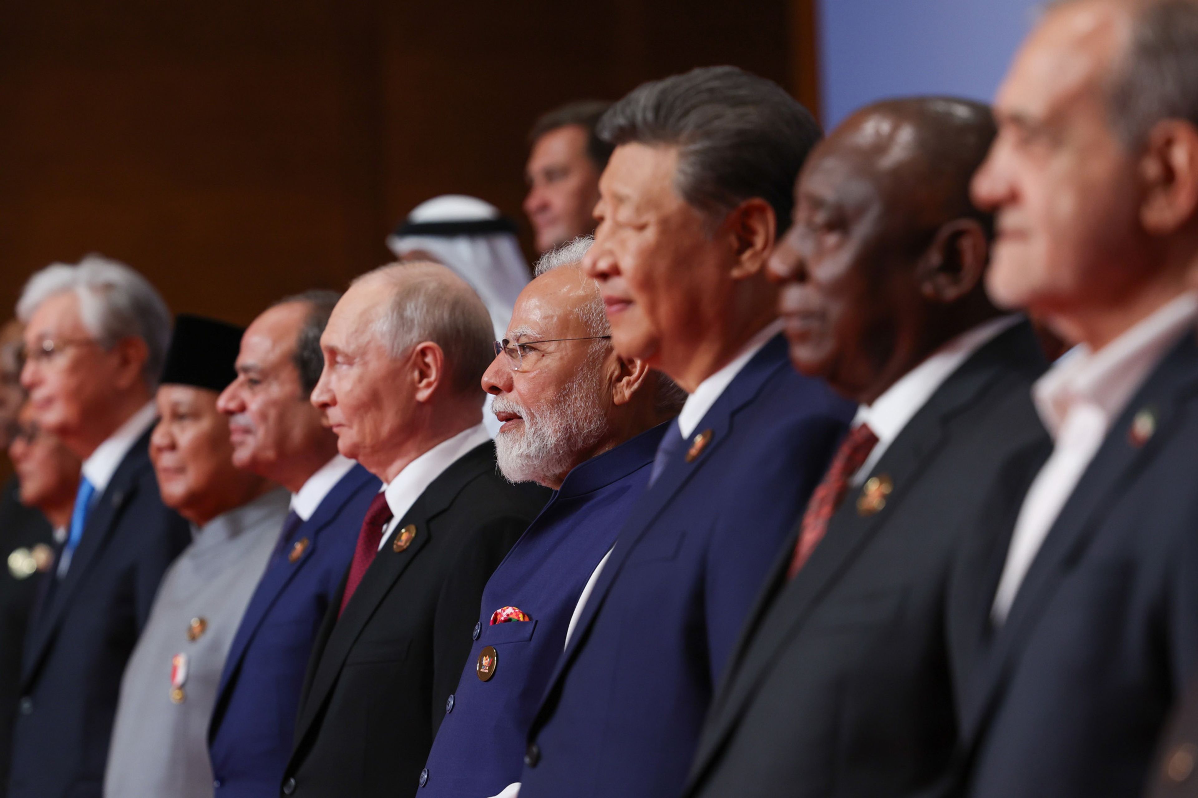 Chinese President Xi Jinping and Indian Prime Minister Narendra Modi with Russian President Vladimir Putin during the 18th BRICS Summit in New Delhi. Photo: DPR PMO, India