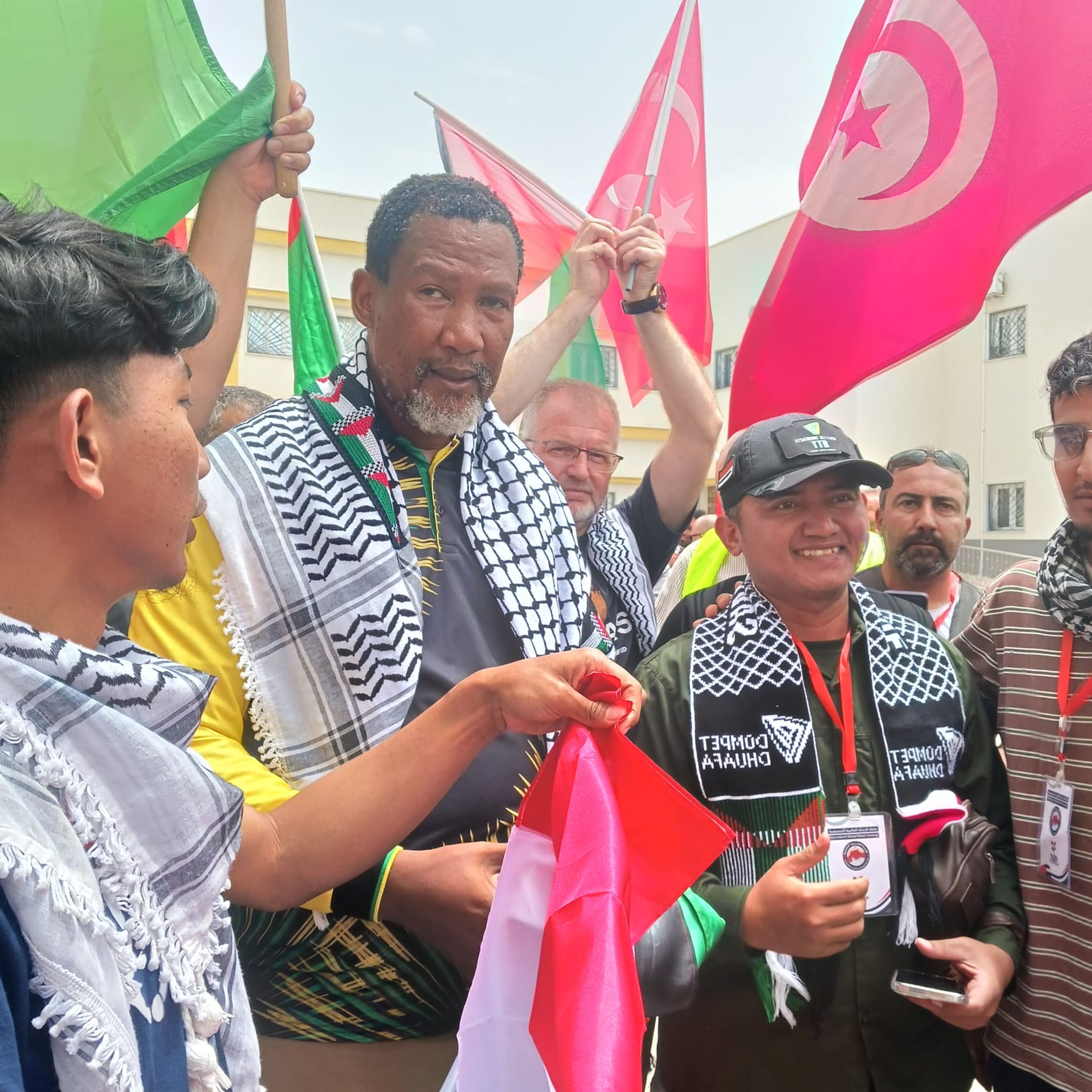 Mandla Mandela with other participants in the North African convoy. 