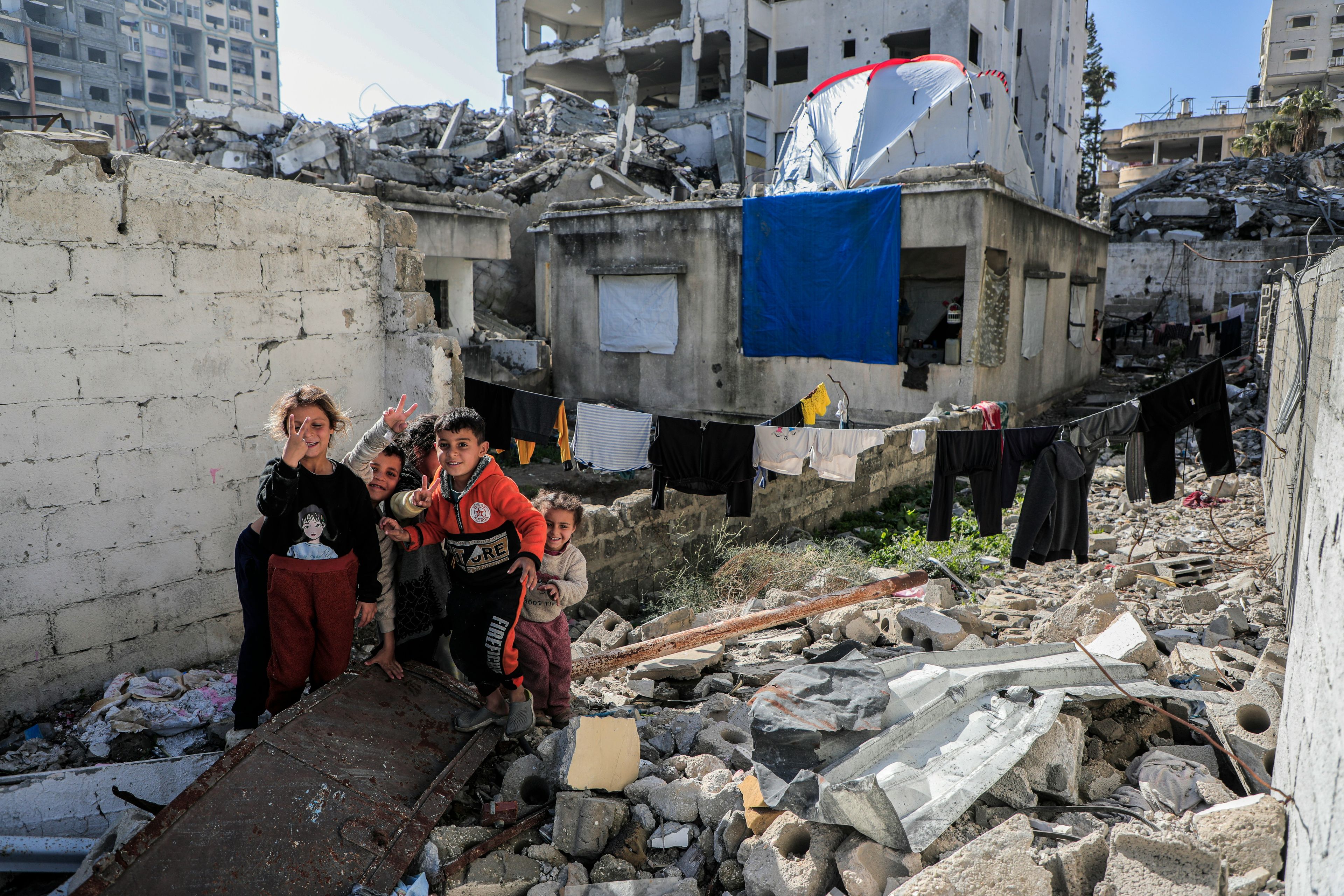 Gaza— Palestine Children among the rubble of their house