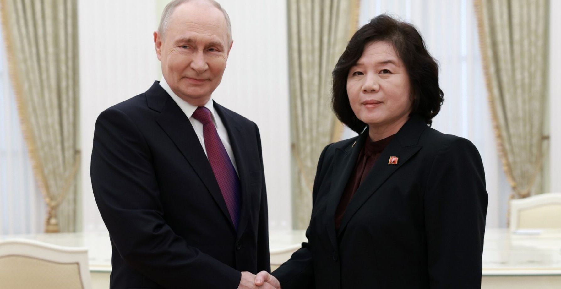 Russia's Vladimir Putin with North Korea's Foreign Minister Choe Son Hui