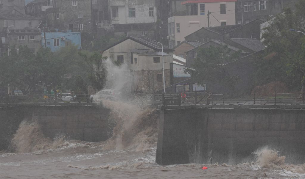 China's national observatory on Sunday activated a red alert -- the highest level in the country's typhoon warning system—as Typhoon Dolphin approached