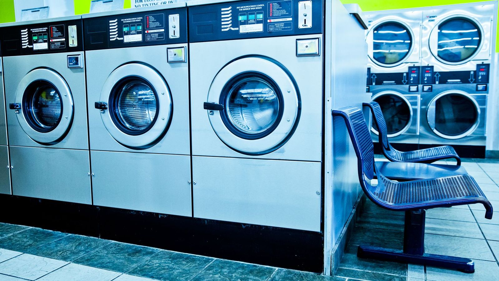 Rows of front-load washers representing laundry facilities in UCLA student apartments