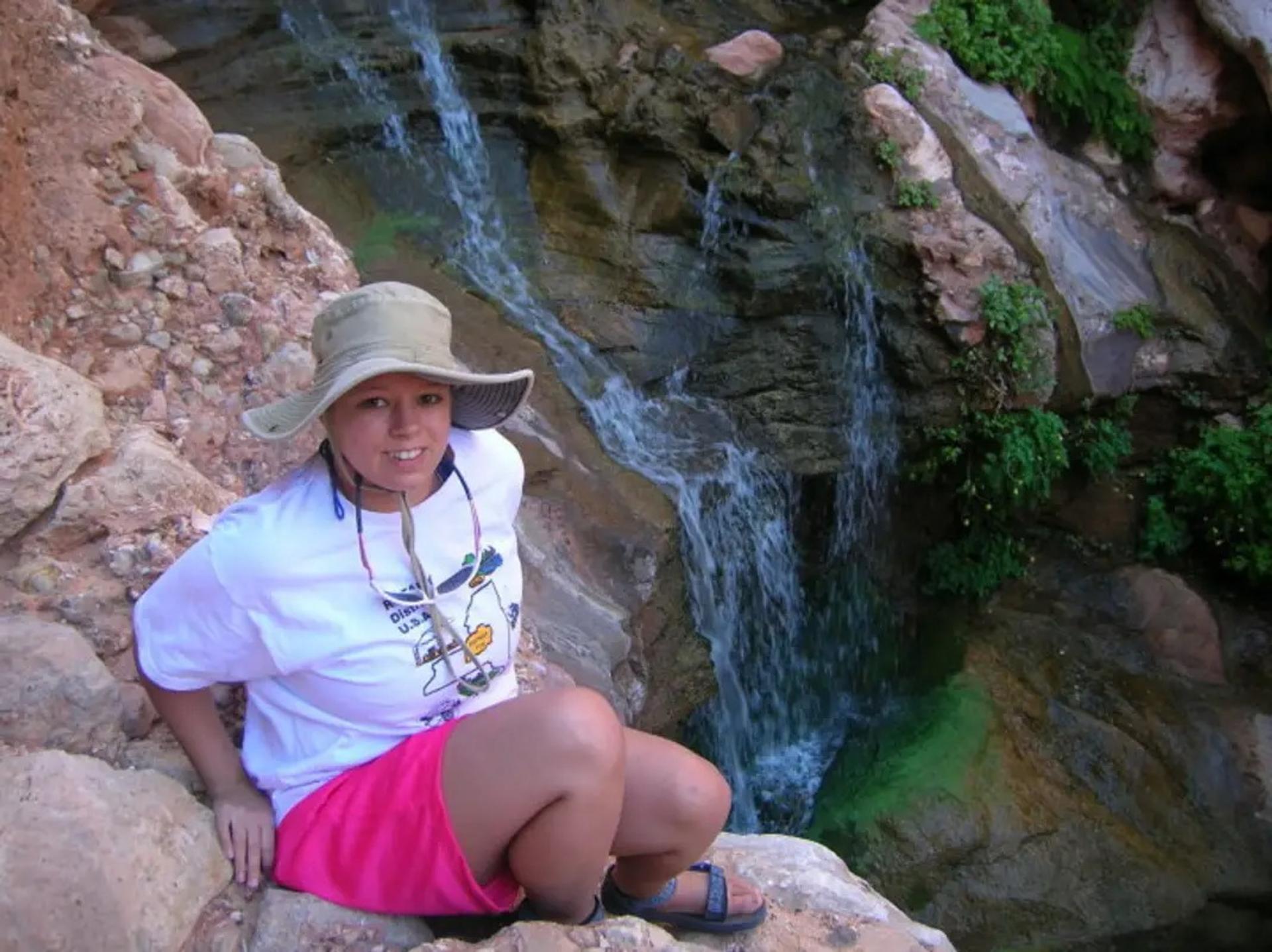 Clare at a waterfall in the Grand Canyon as part of Tulane University's Colloquium course 