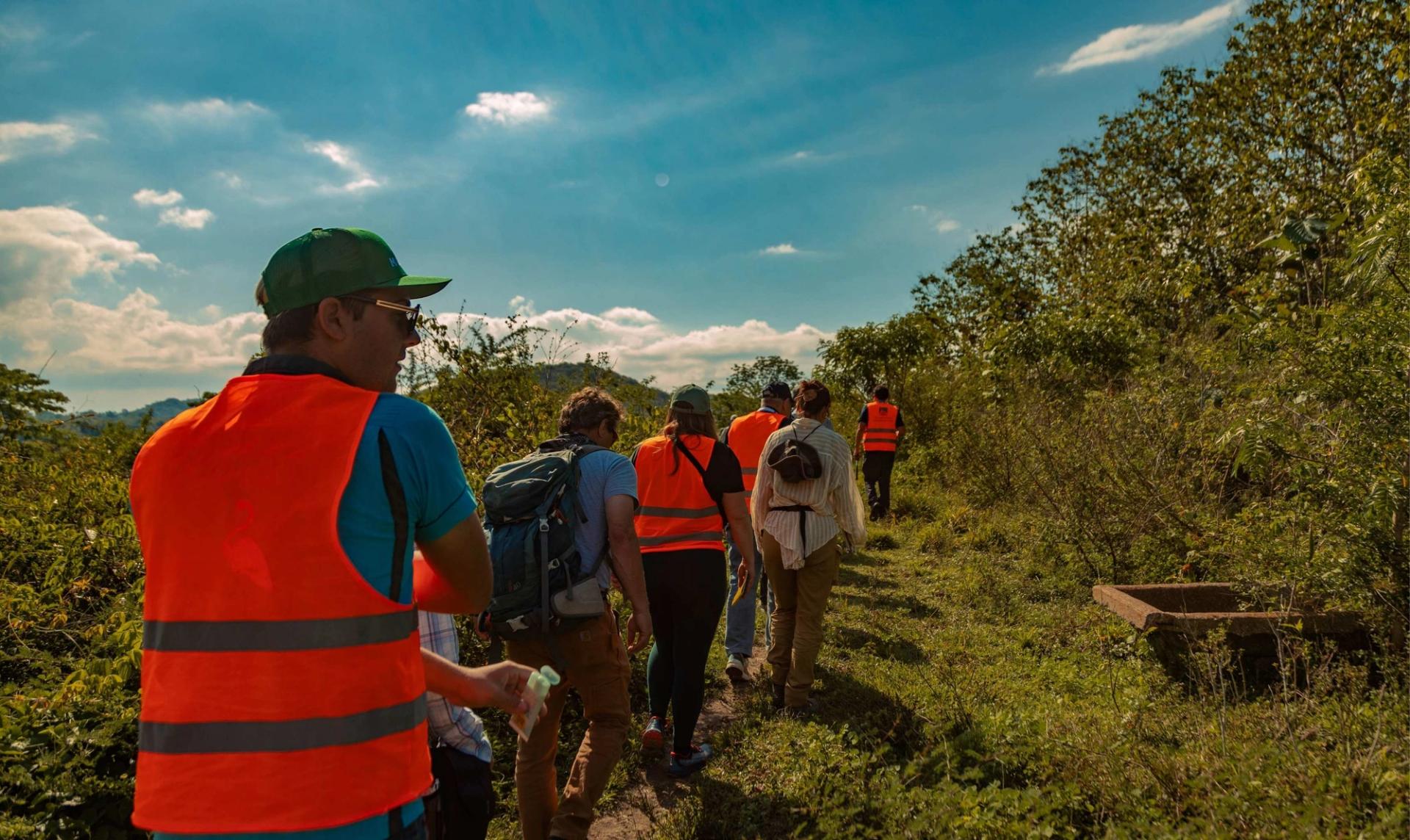 GSA Thompson Field Forum participants wearing orange vests exploring Cuba