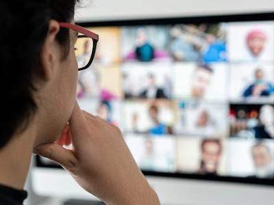 Man watching webinars.