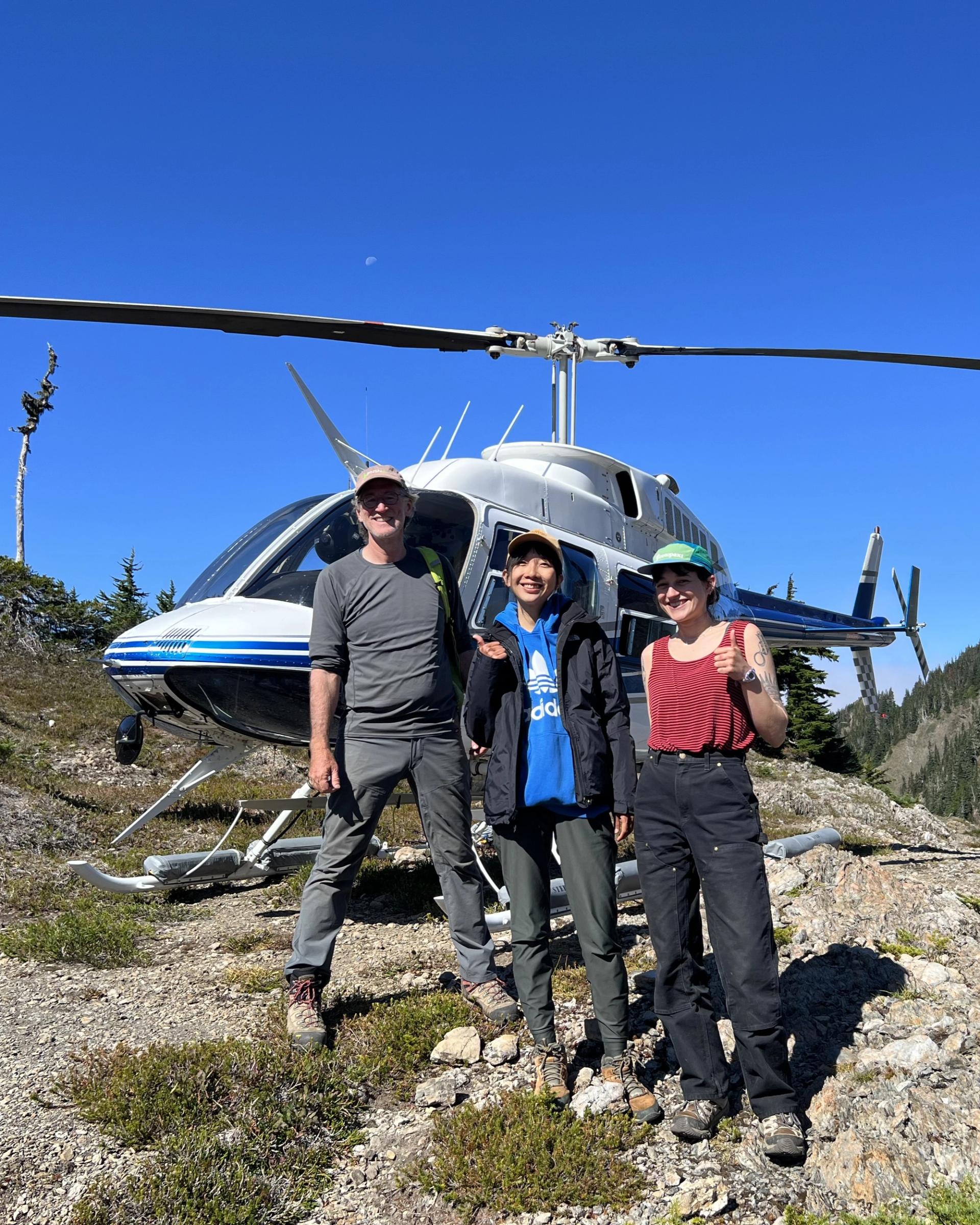 Photo of GSA Graduate Student Research Grant Recipients conducting geoscience research in the field by helicopter