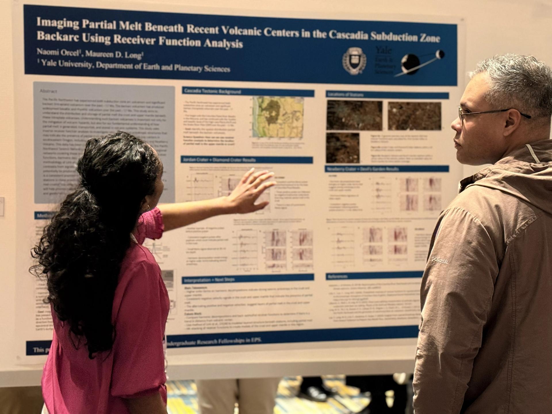 Photo of researcher presenting poster at GSA Section meeting