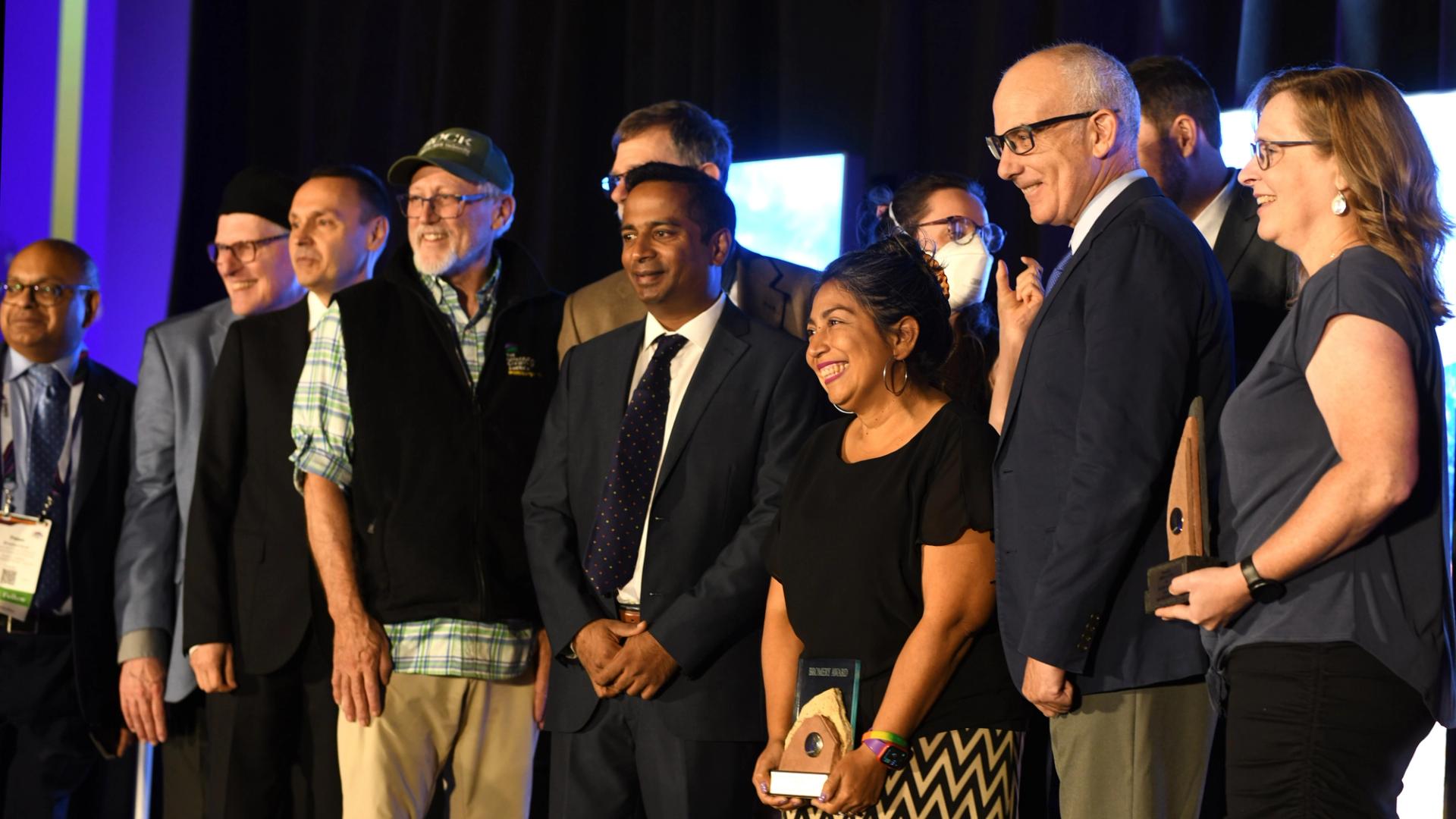 Awardees posing for photo at GSA Connects 2025 award ceremony