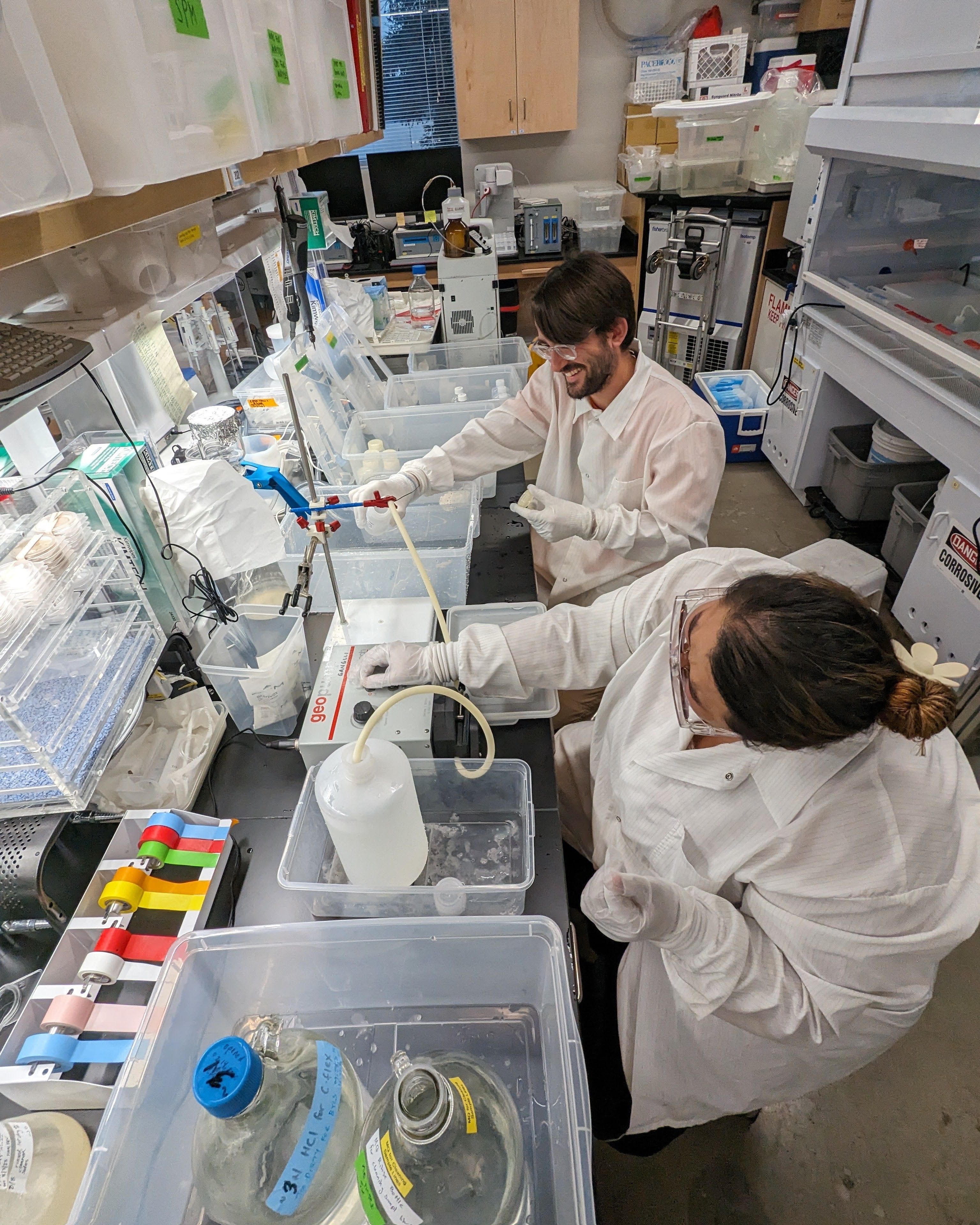 Photo of GSA Graduate Student Research Grant Recipients conducting geoscience research in the lab