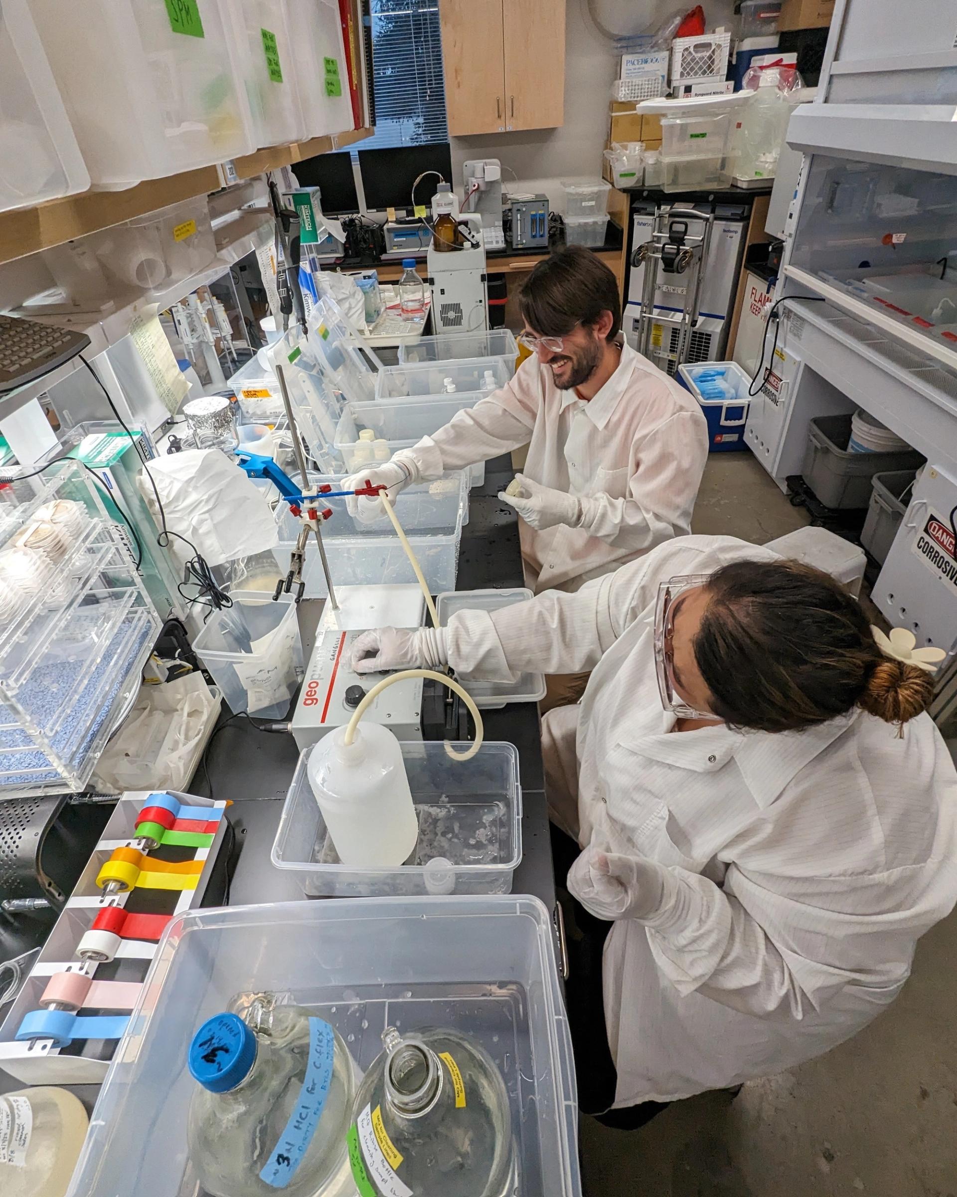Photo of GSA Graduate Student Research Grant Recipients conducting geoscience research in the lab