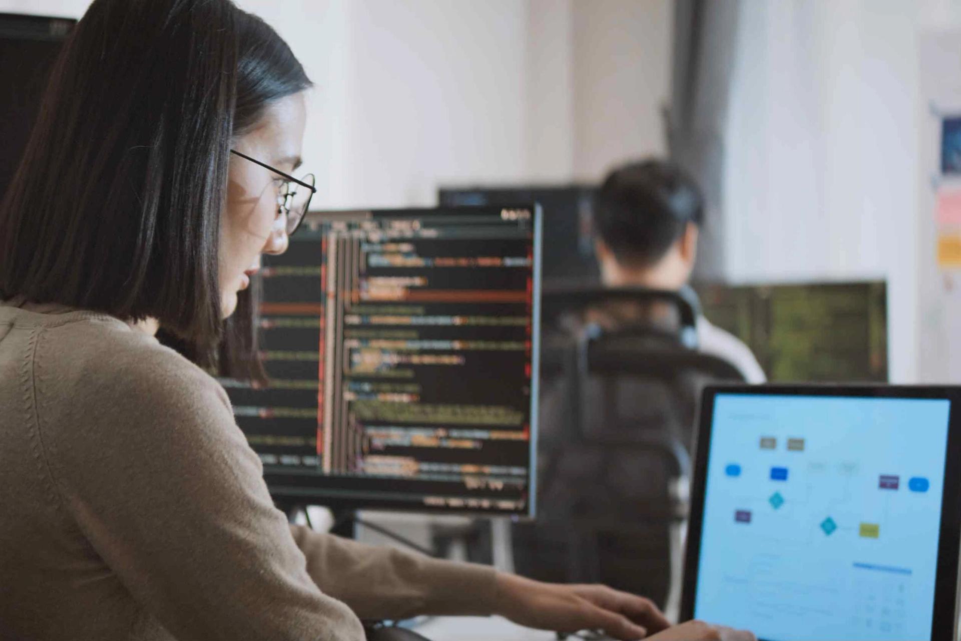 Image of scientist coding and modeling on computer