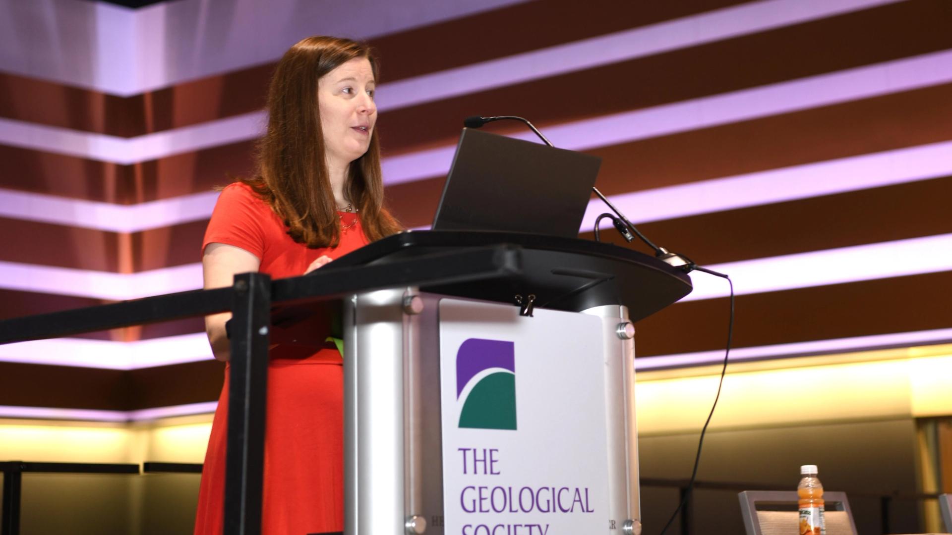 GSA speaker giving presentation on a podium at the annual Connects meeting