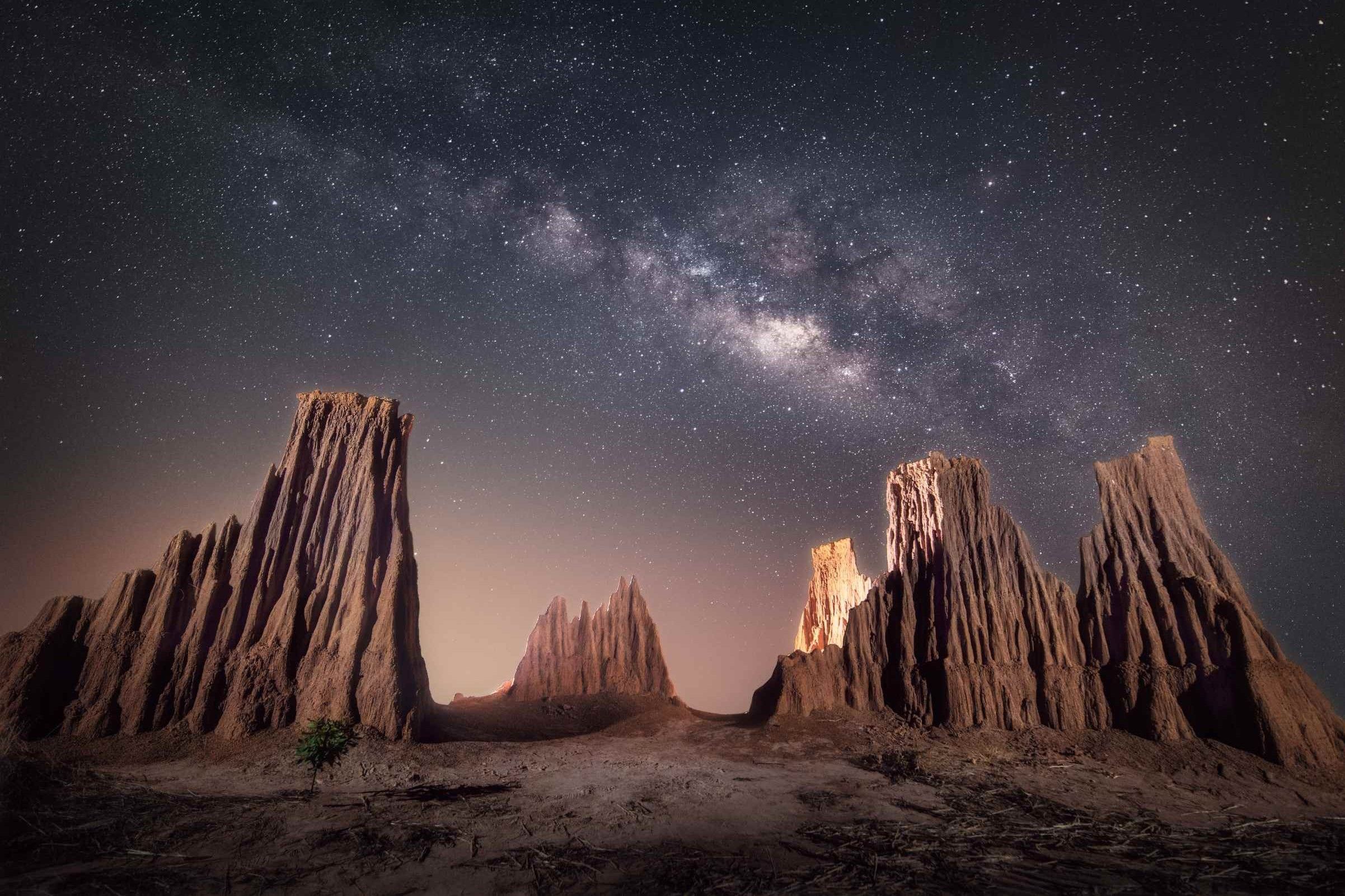 Starry Night With Dramatic Milky Way Galaxy of Solar System Astronomy in Cathedral Gorge State Park in Nevada.