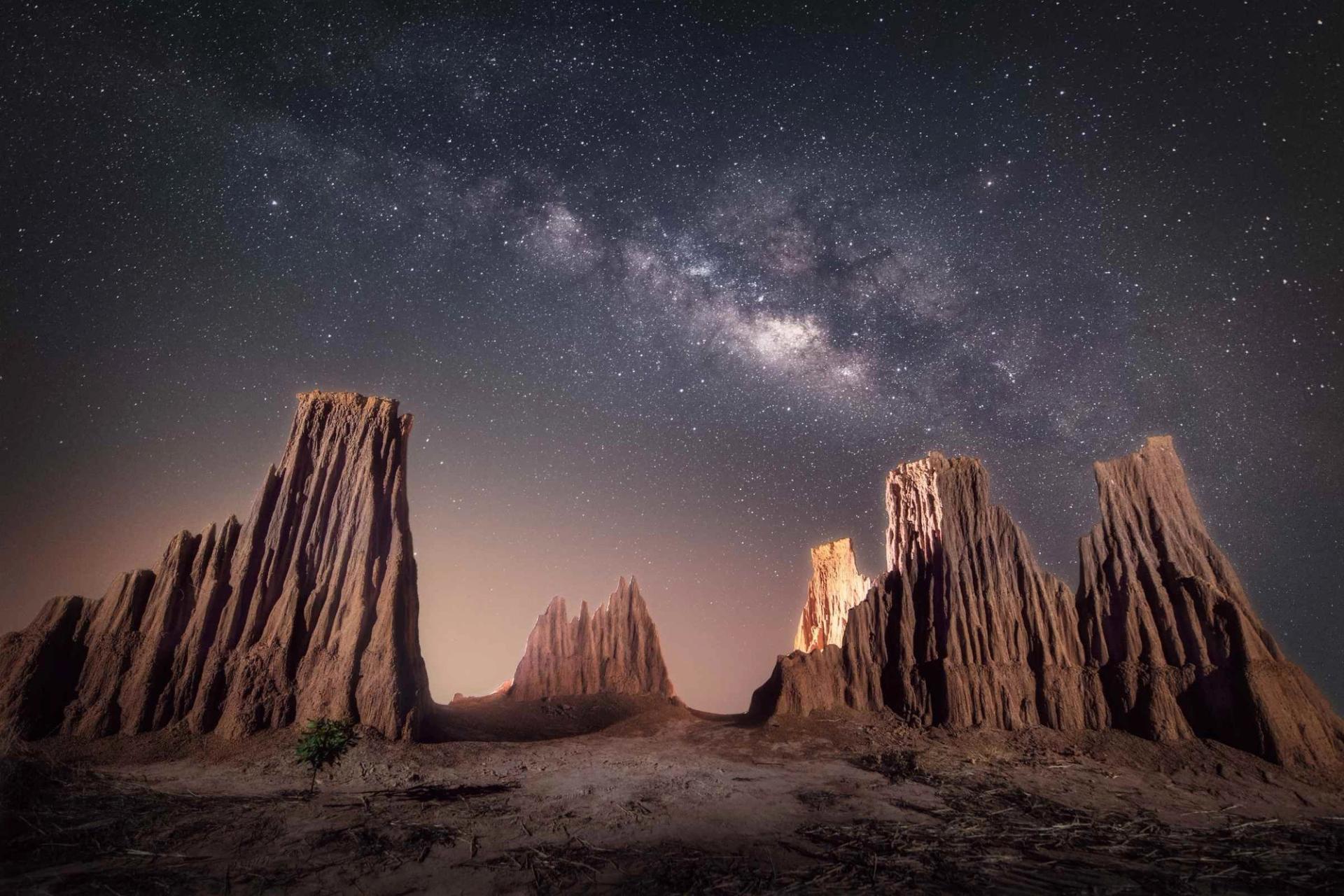 Starry Night With Dramatic Milky Way Galaxy of Solar System Astronomy in Cathedral Gorge State Park in Nevada.