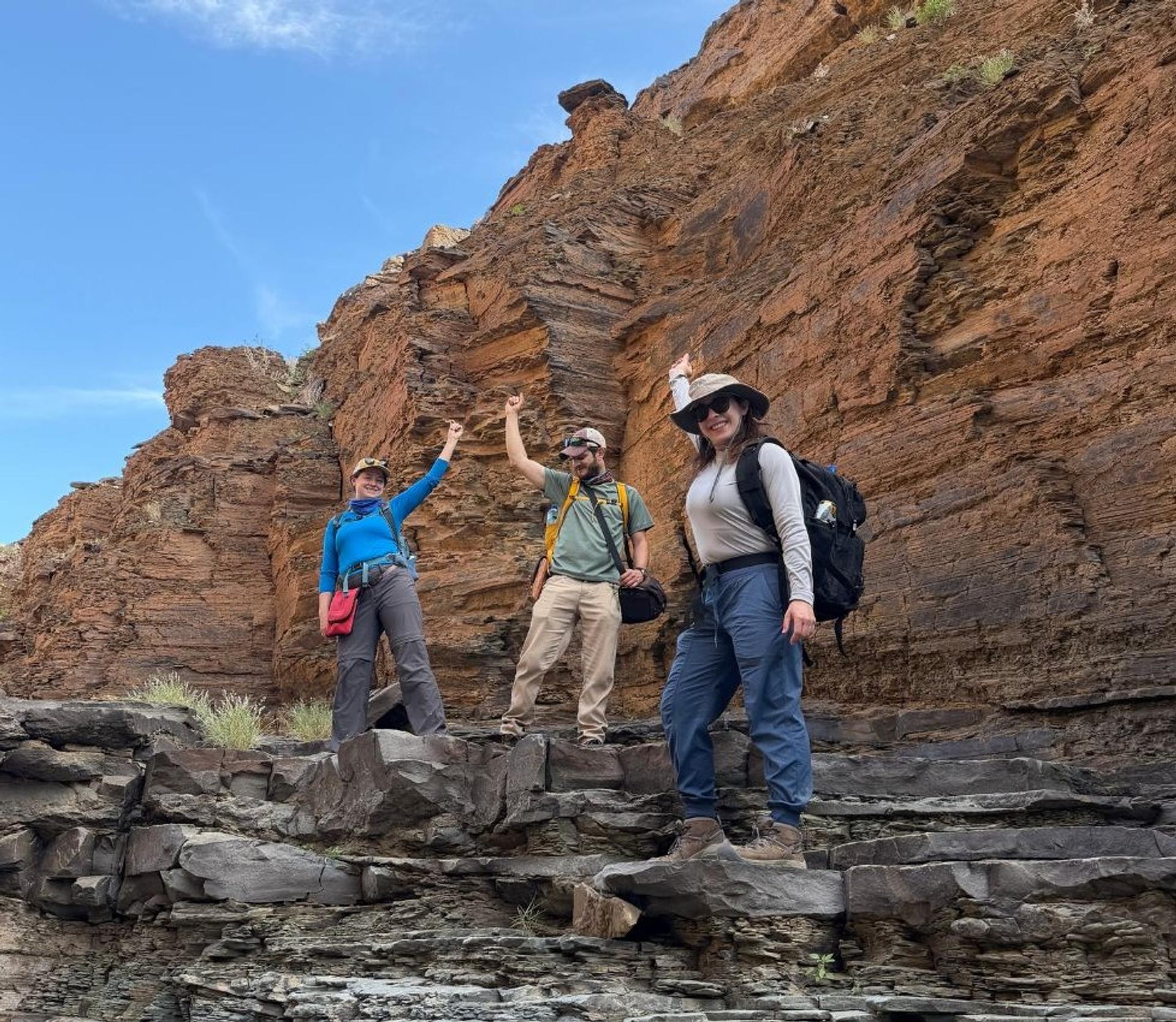 Photo of GSA Members next to a rock formation