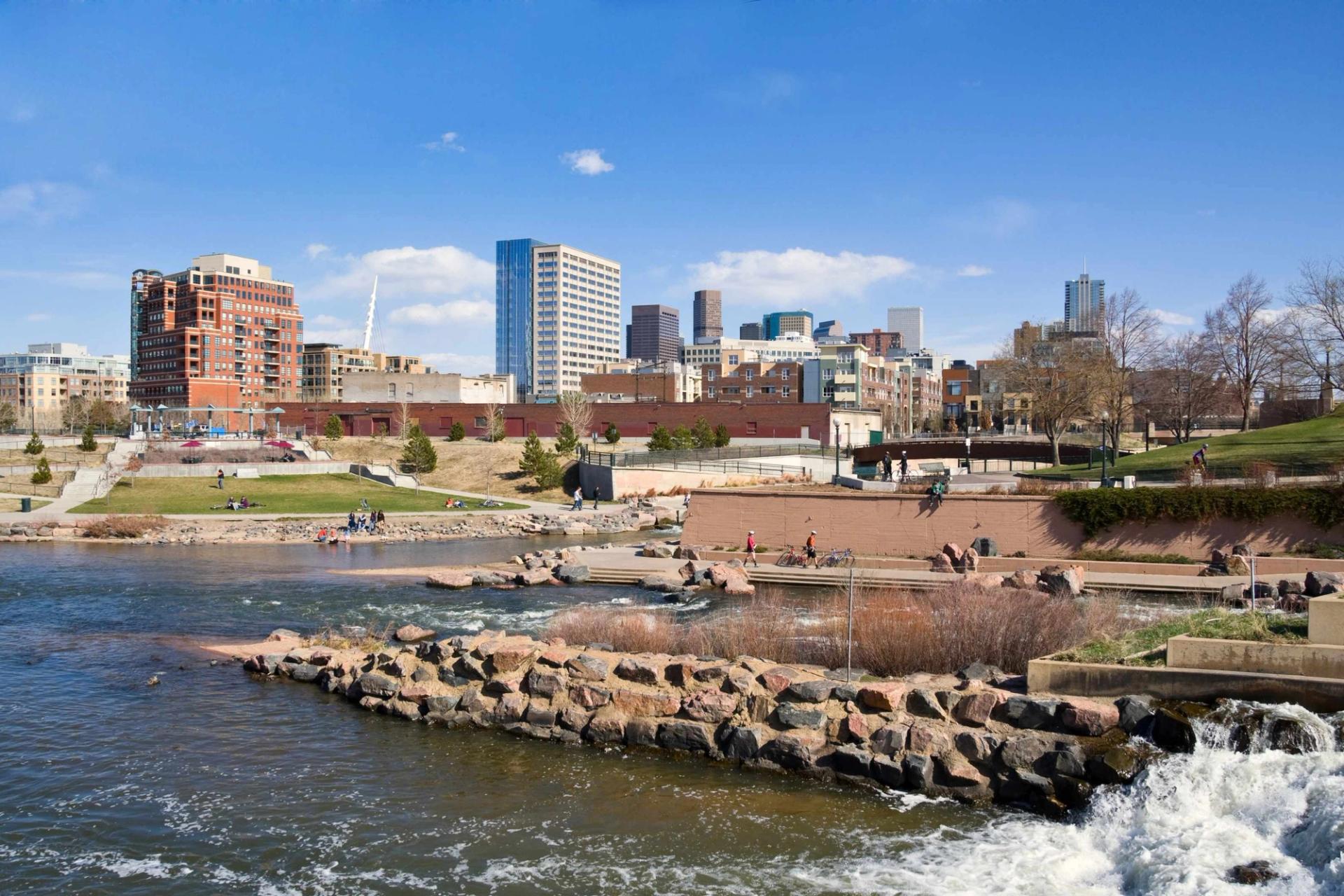 Scenic image of water irrigation system with the city of Devner the background