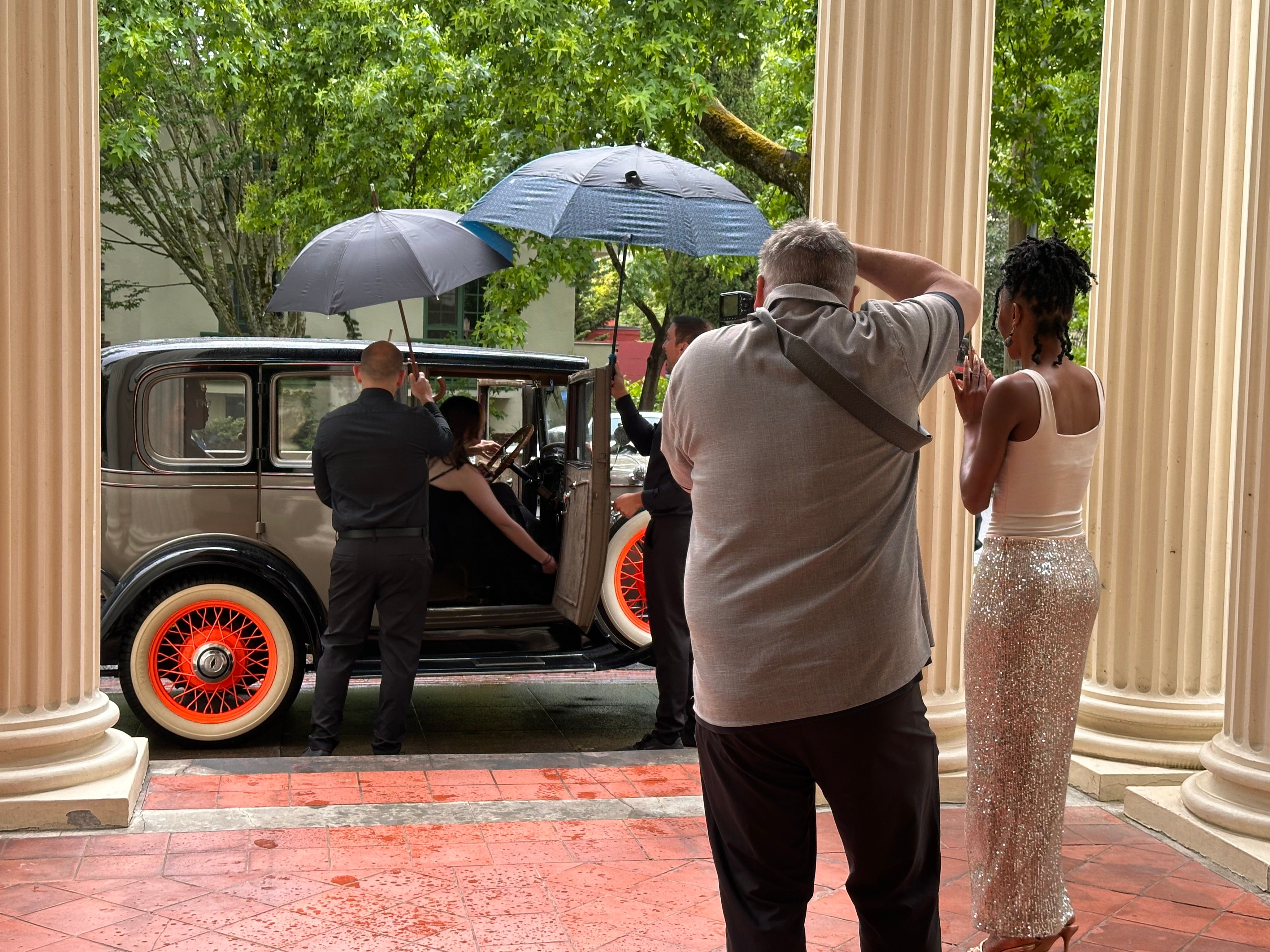 Guests arriving by classic car under the White House portico